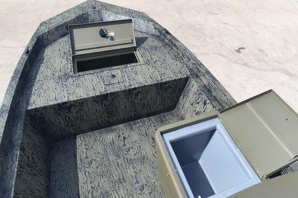 2026 Tracker Grizzly 1648 SC boat interior with open storage compartments.
