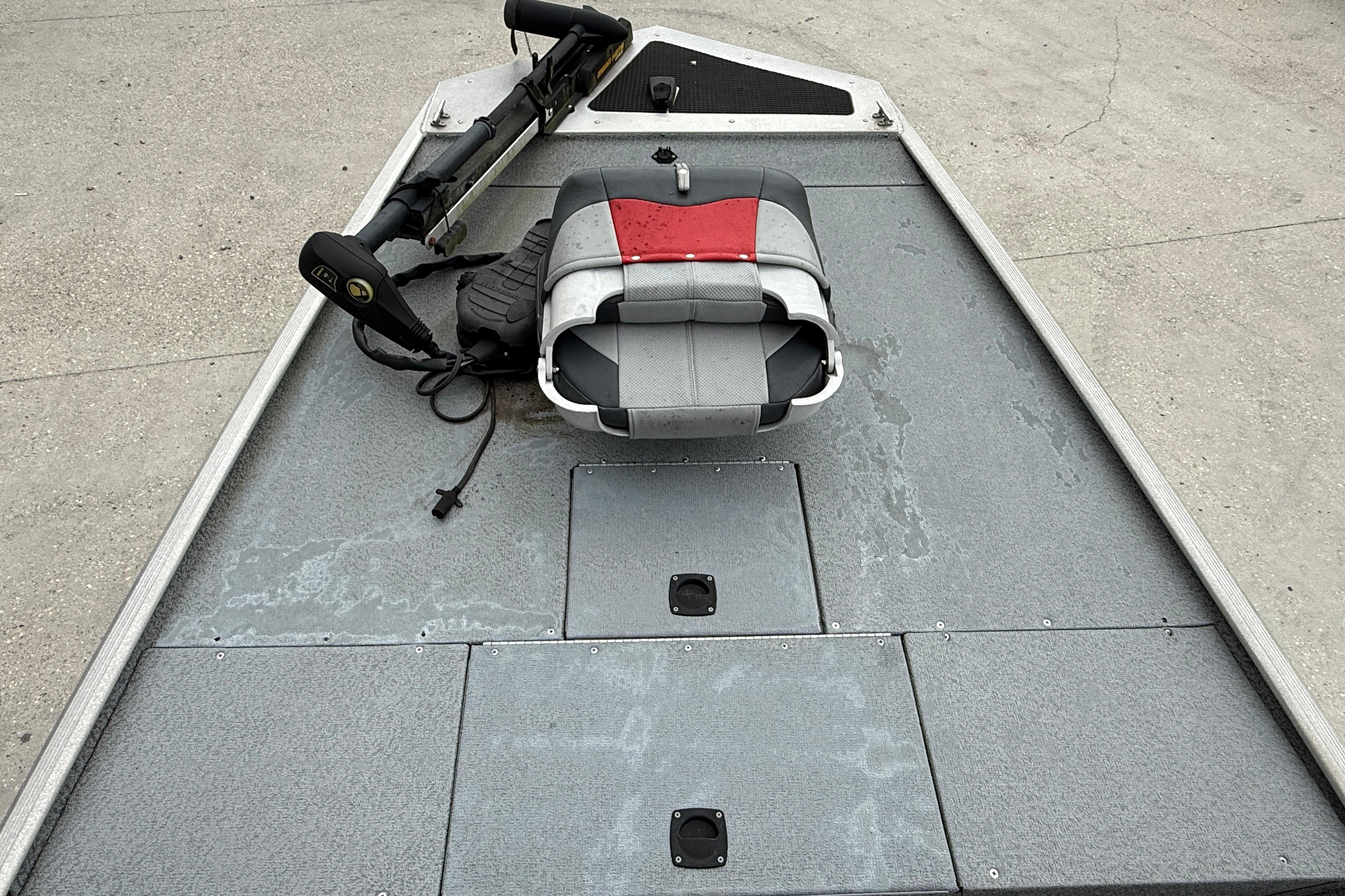 2016 Tracker Pro 170 boat deck with seat and trolling motor.