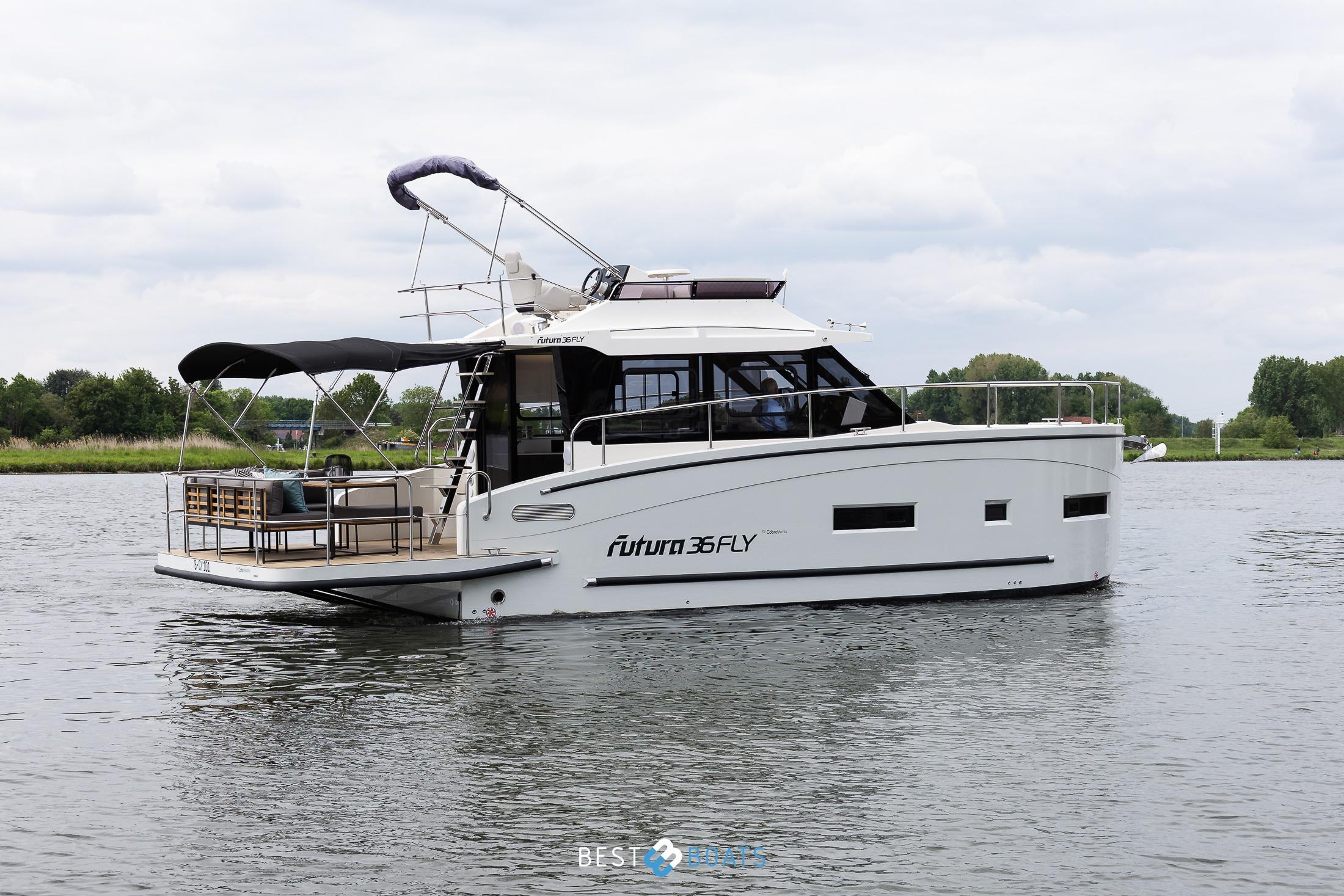 2023 Cobra Yachts Futura 36 Premium Fly on a serene waterway.