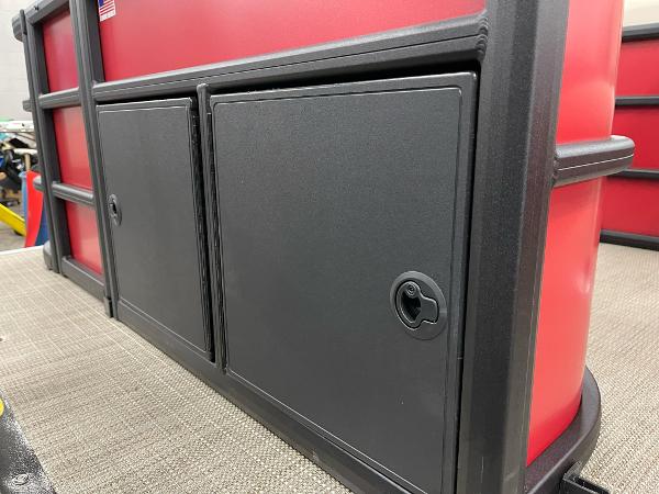 2025 Bentley Pontoons 200 Fish-N-Cruise storage compartment, featuring sleek black doors and red accents.