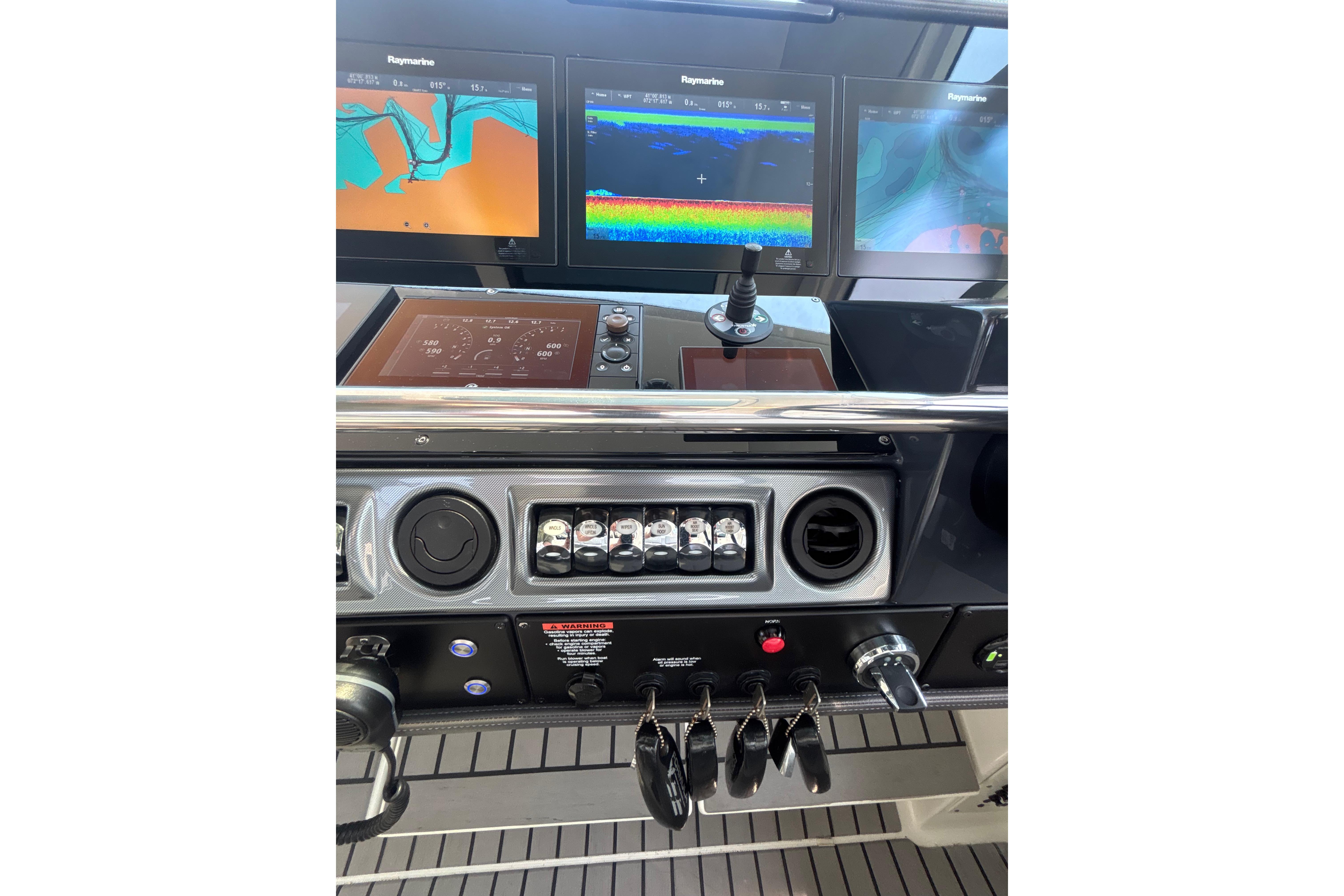 Control panel of 2019 Formula 430 Super Sport Crossover with Raymarine displays.