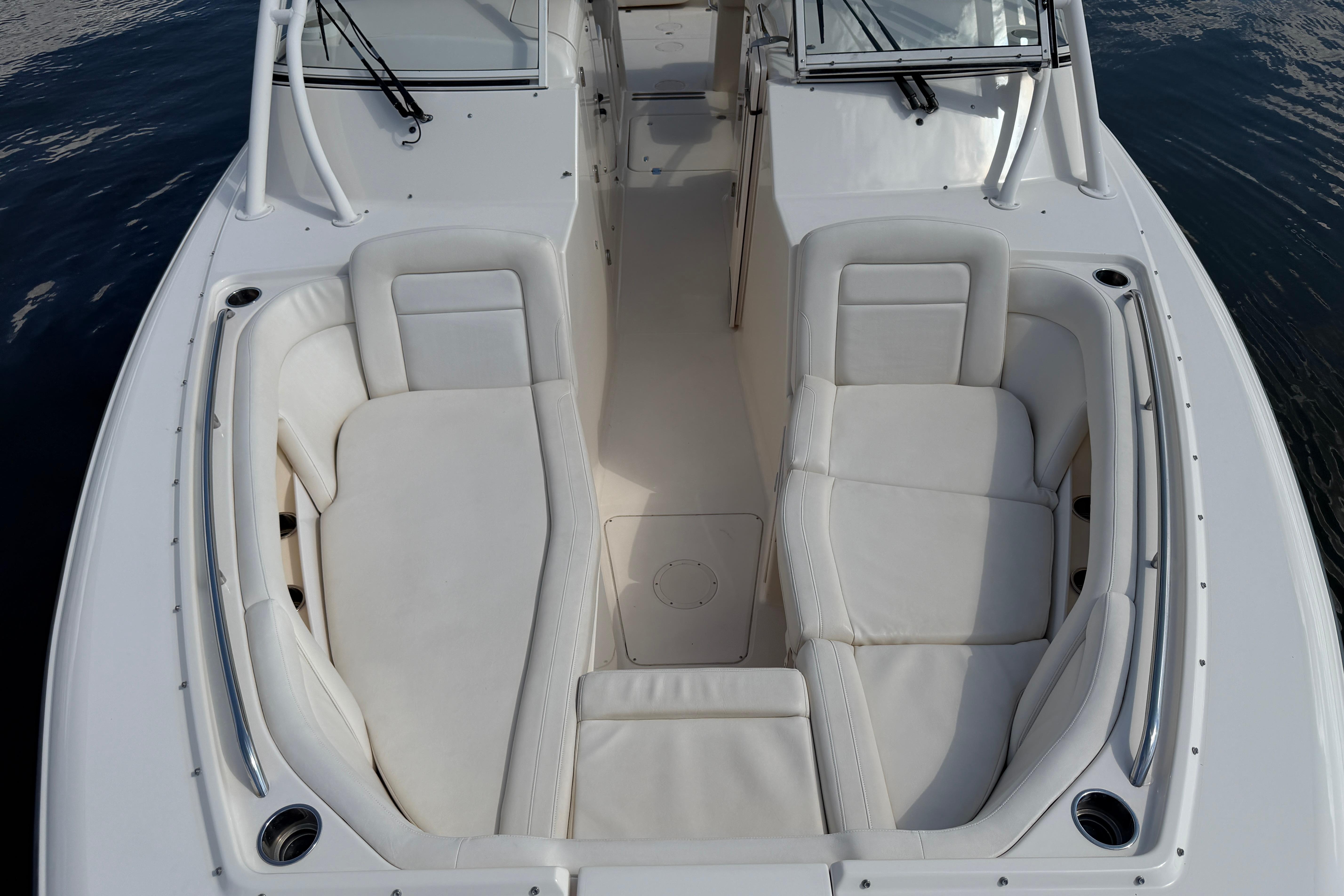 2017 Grady-White Freedom 335 boat interior with white cushioned seating.