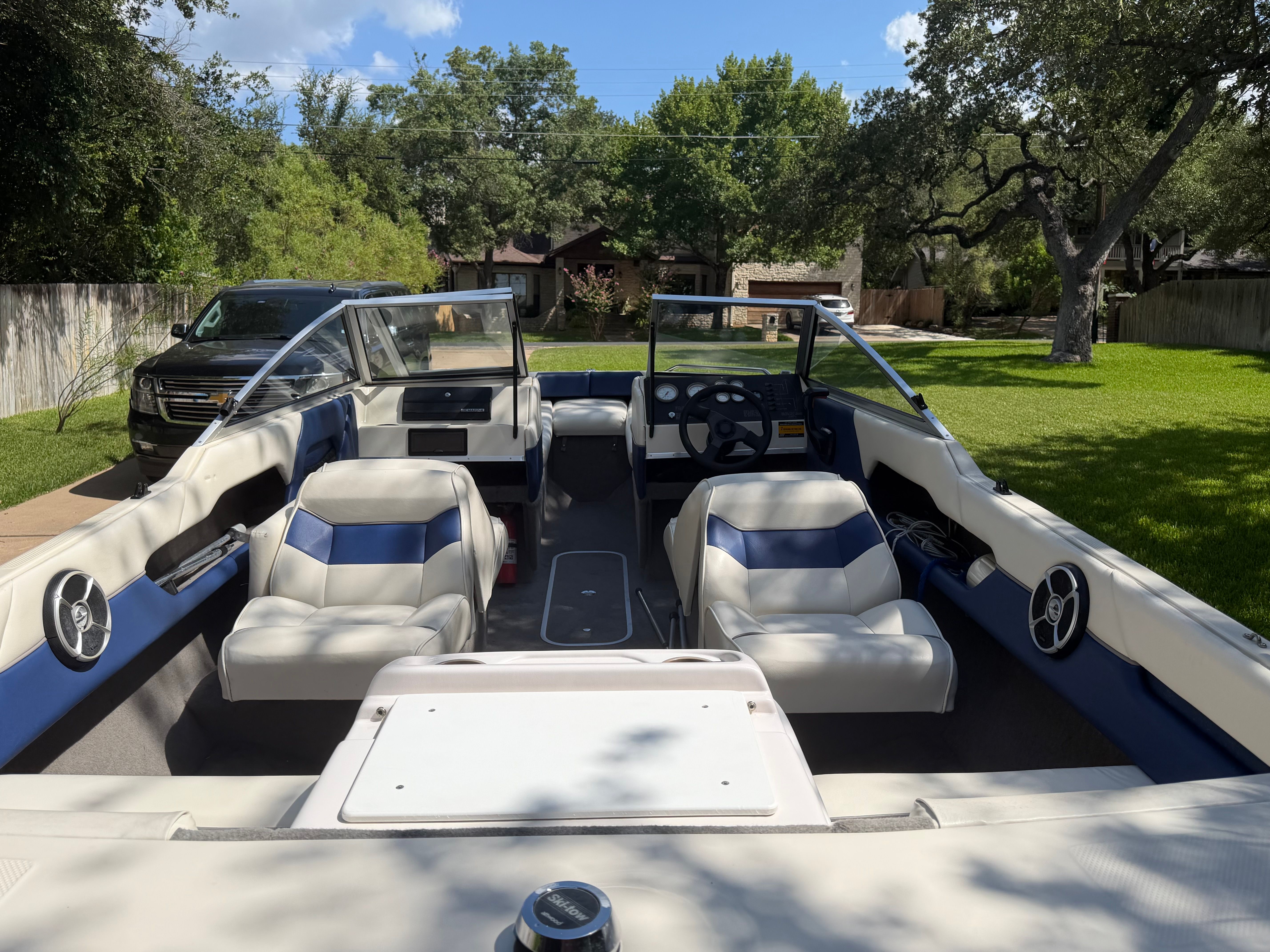 Interior view of a 1994 Bayliner CAPRI with blue and white seating.