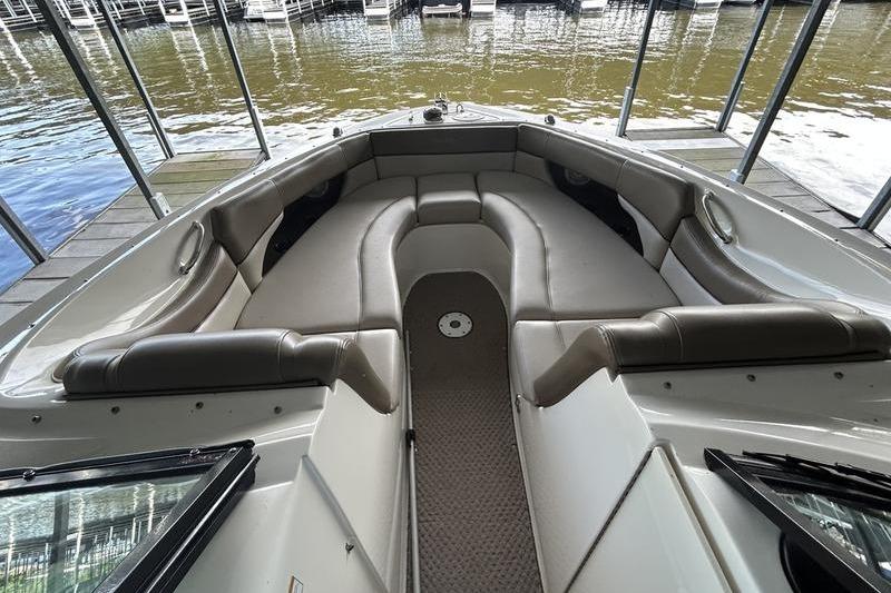 2011 Sea Ray 300 SLX boat interior with spacious seating and waterfront view.
