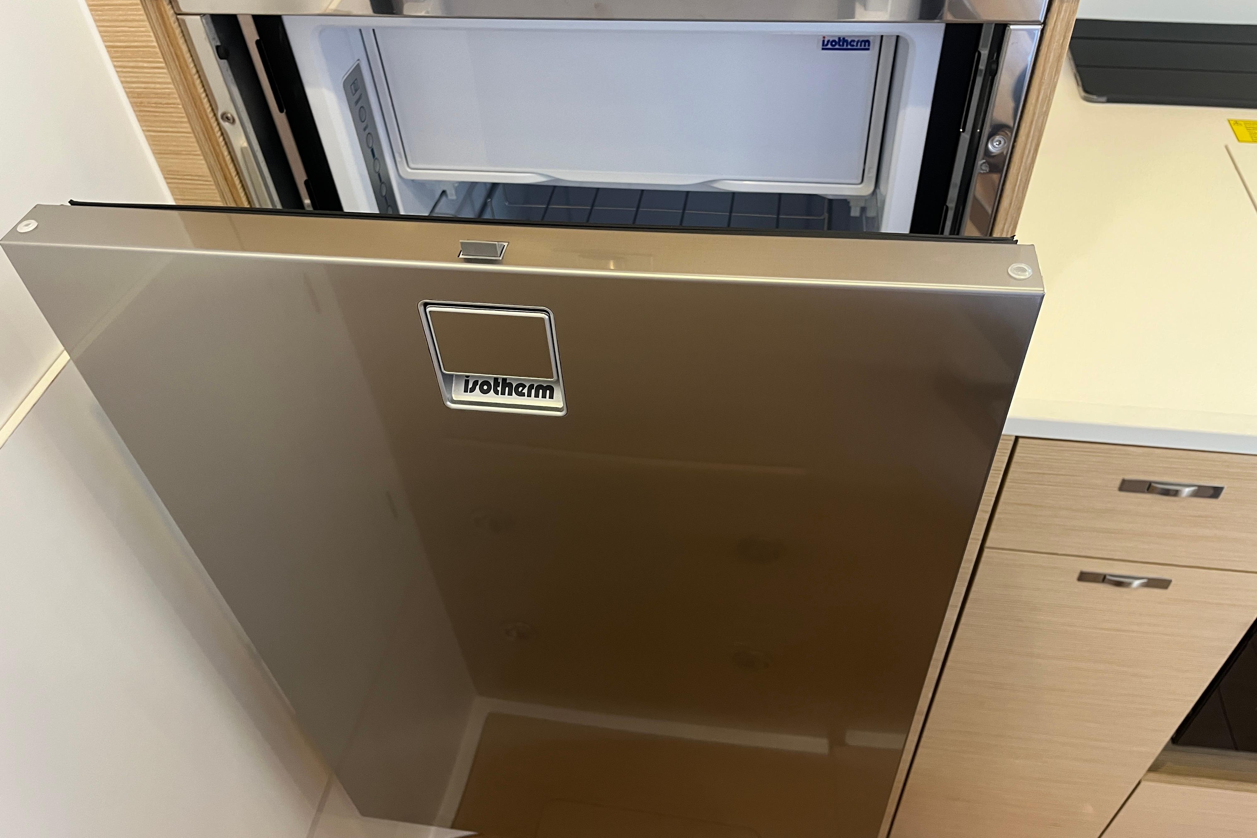 Modern Isotherm refrigerator in a 2025 Hanse 360 yacht kitchen.