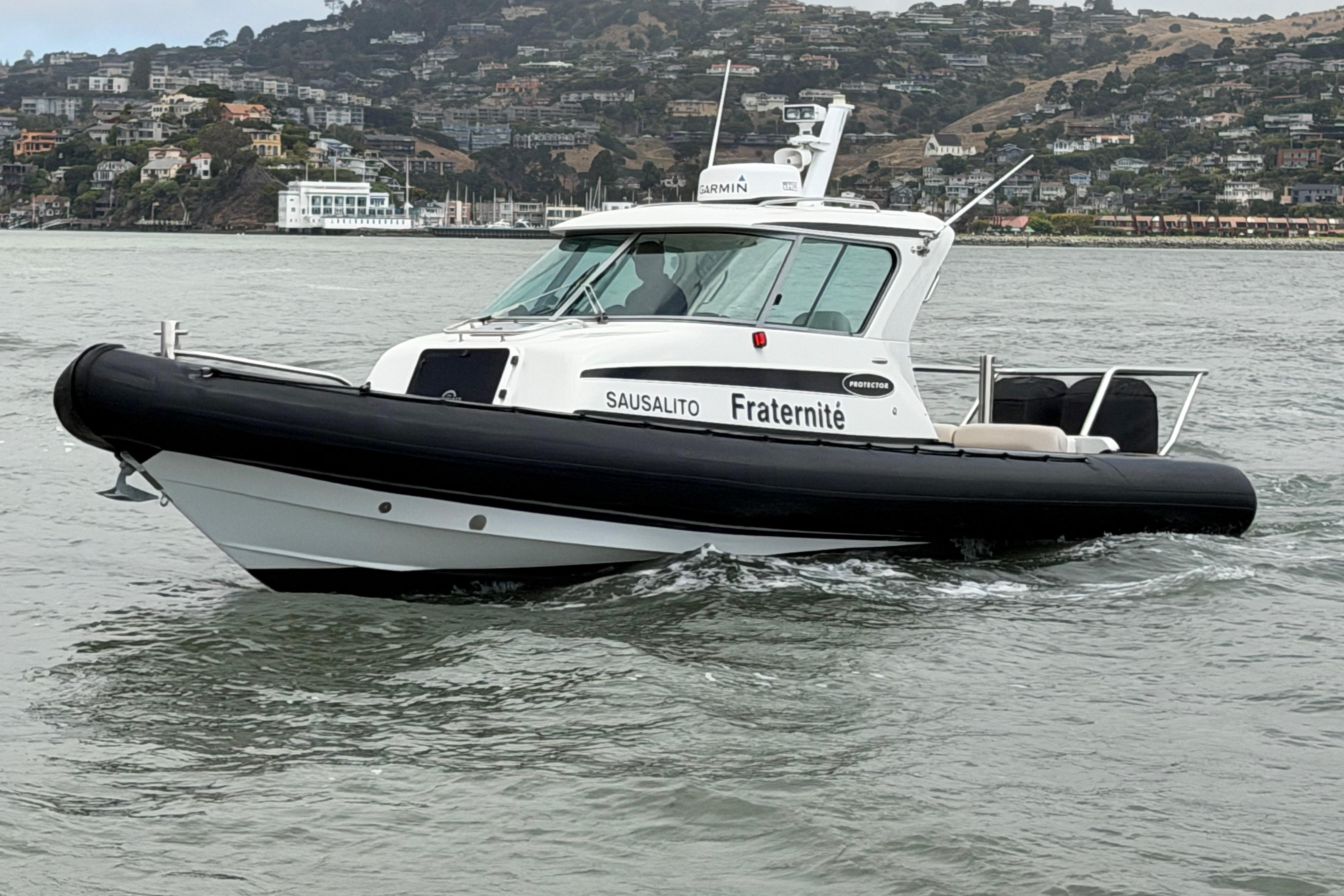 2016 Protector Targa 30 boat named "Fraternité" on water near Sausalito.