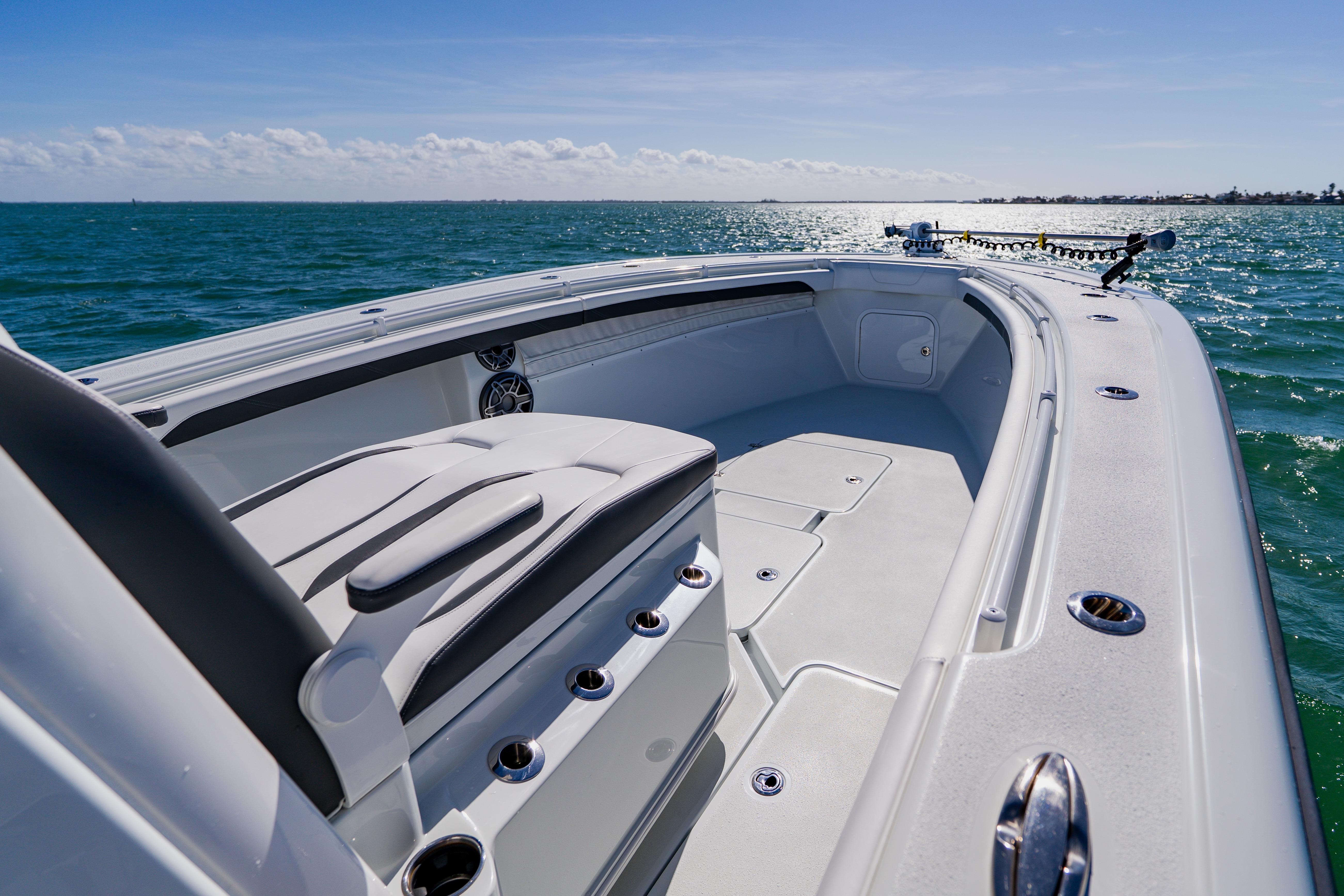 2025 Yellowfin 36 Offshore boat on open sea, showcasing sleek design and spacious deck.