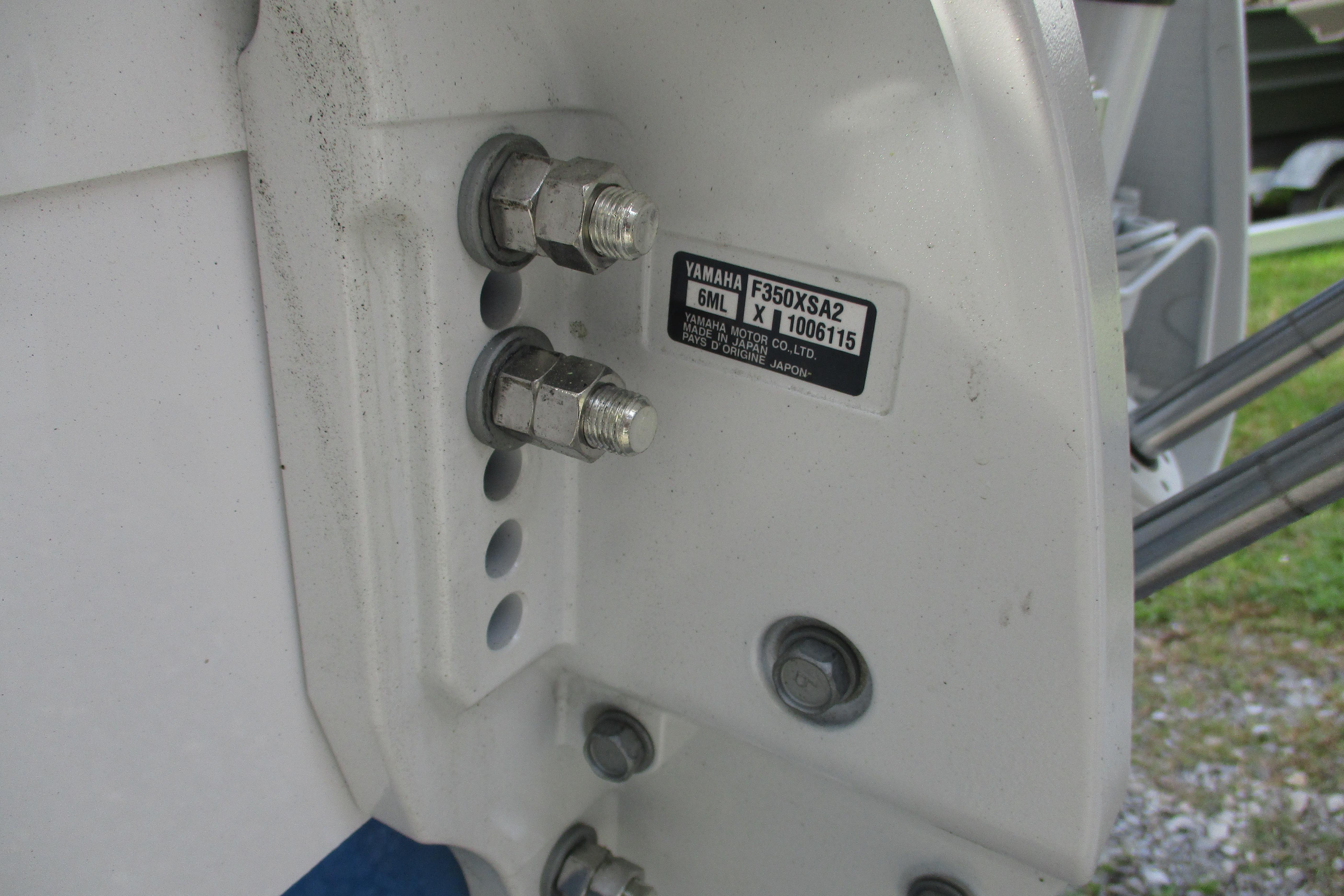 Close-up of Yamaha motor mount on 2026 Sportsman Open 302 Center Console boat.