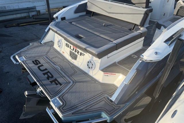 2023 Cobalt R6 Surf boat with sleek design and spacious seating area.