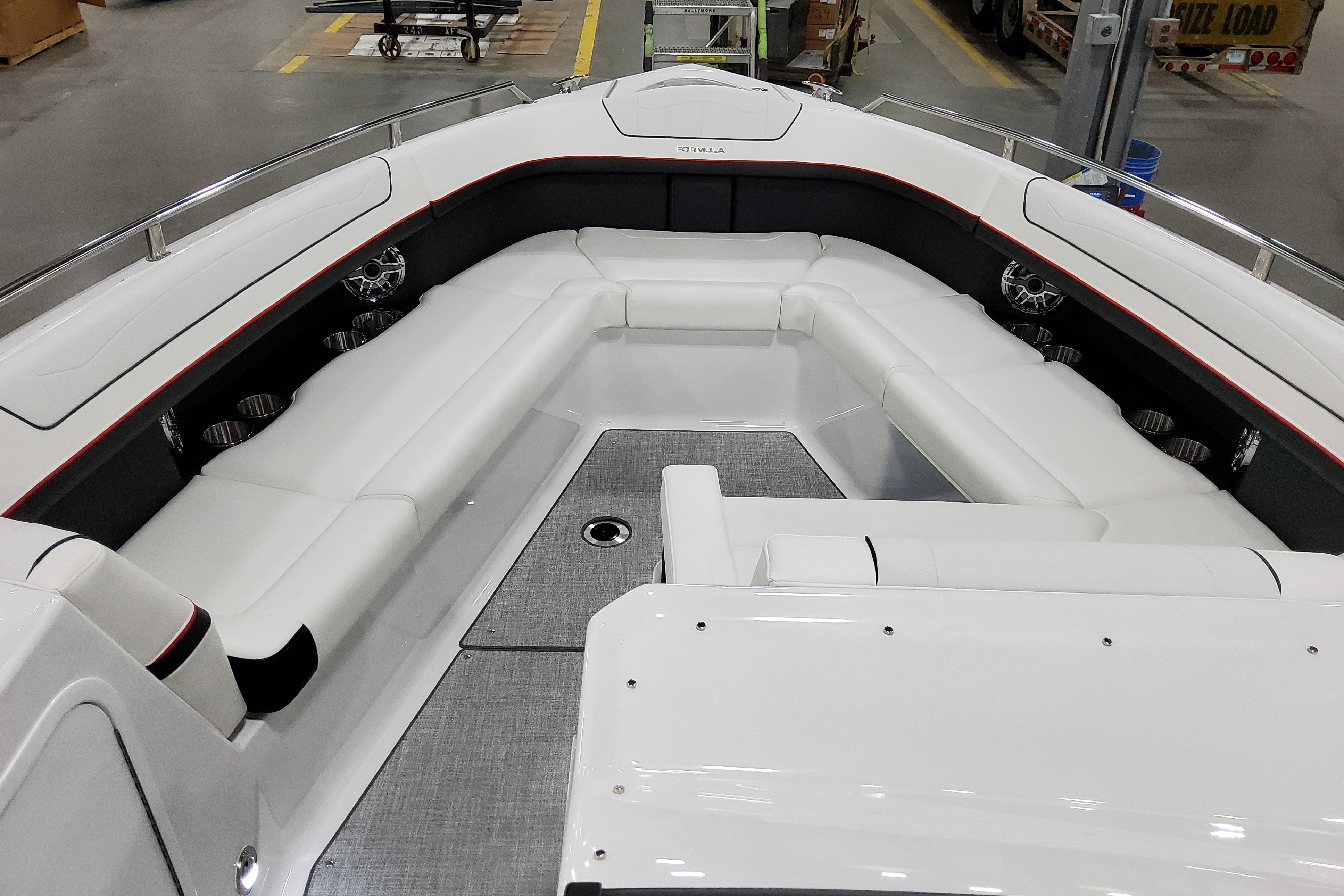 2027 Formula 350 Crossover Bowrider I/O with spacious white seating and modern design.