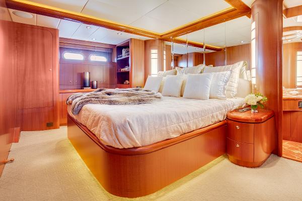Luxurious bedroom in a 2006 Horizon 82’ Cockpit Motoryacht.