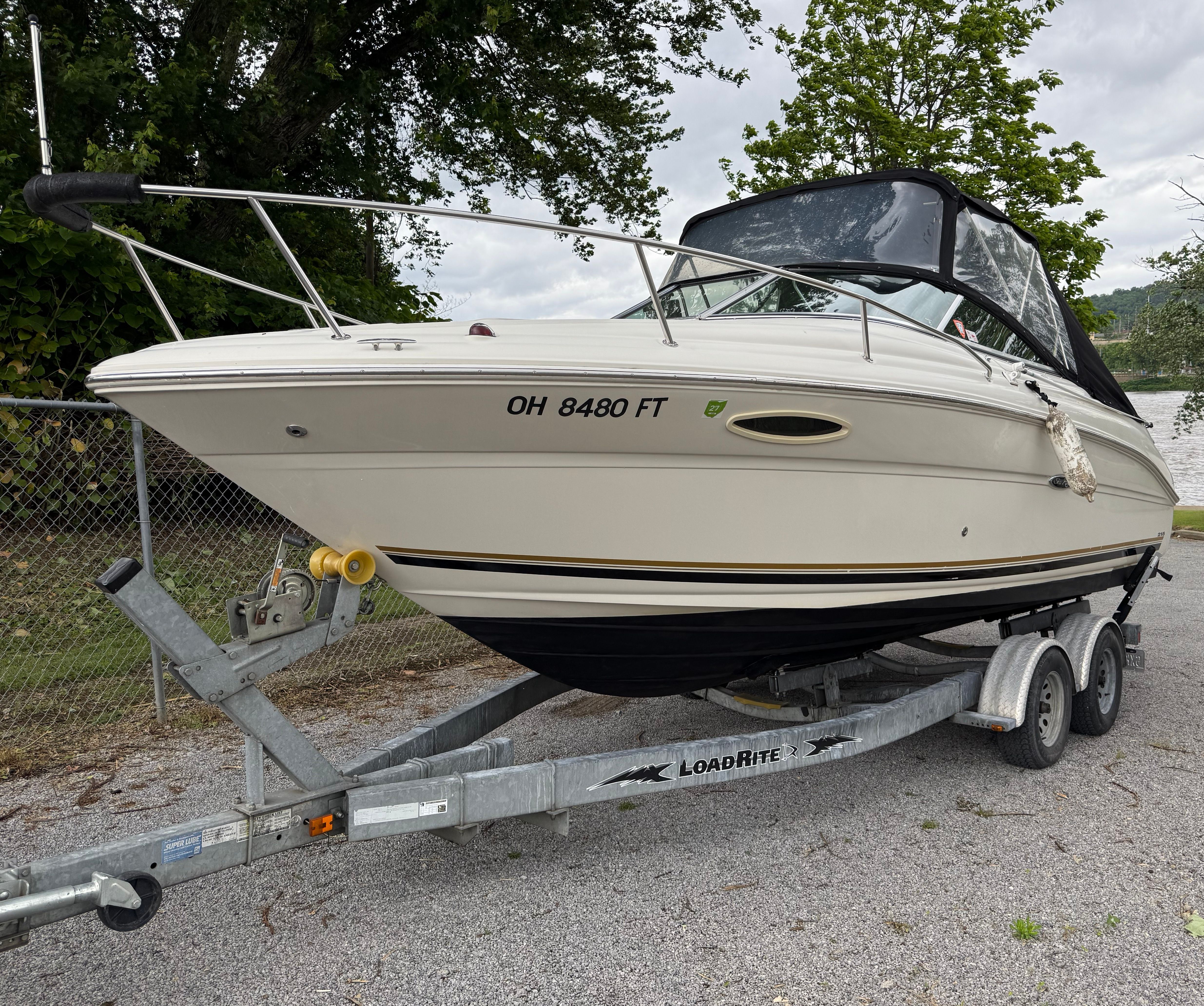 2006 Sea Ray 215 Weekender on trailer, side view.