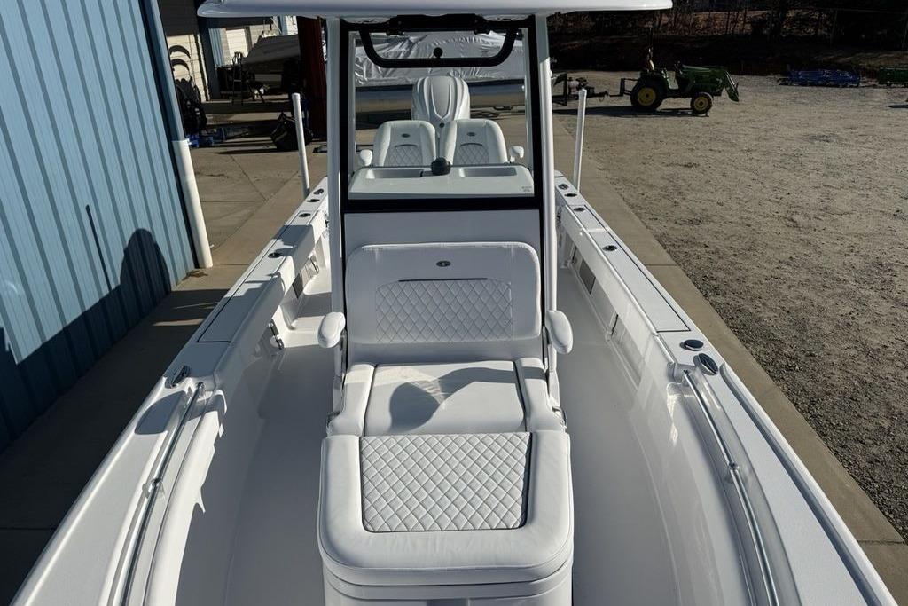 2026 Sportsman Masters 247OE Bay Boat with sleek white seating and modern design.