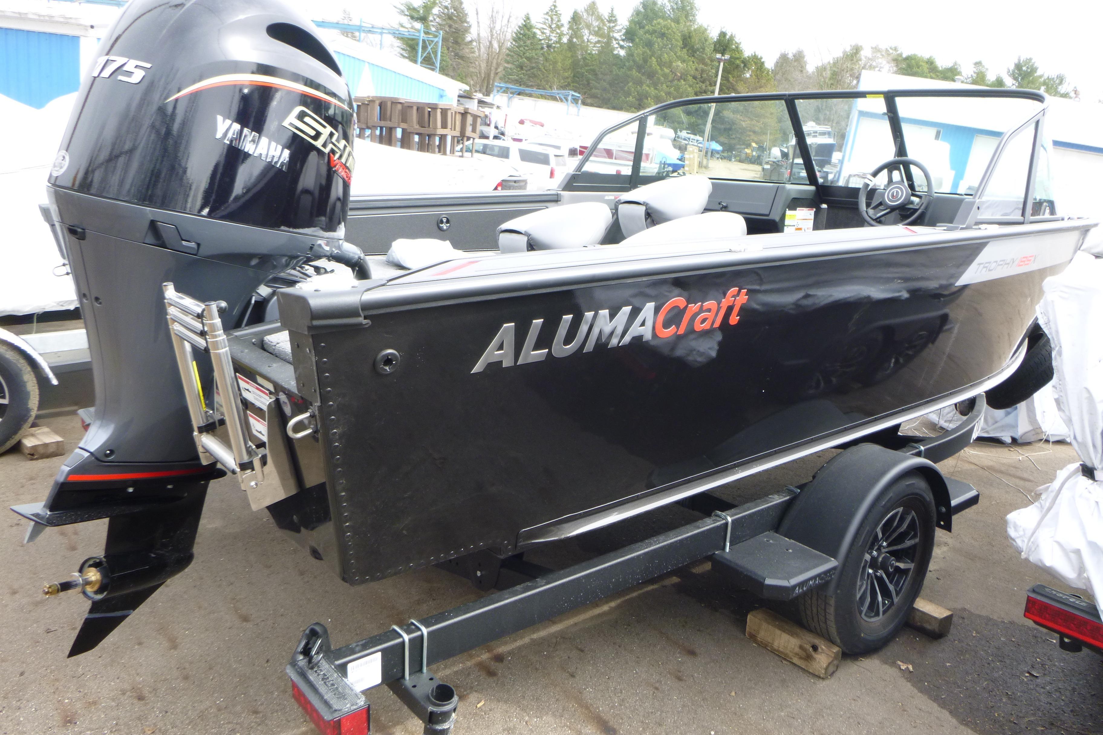 2025 Alumacraft Trophy 185X Sport boat with Yamaha engine on trailer.