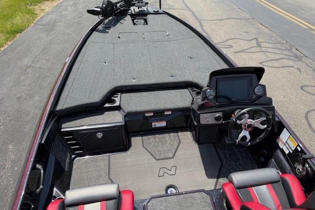 2026 Nitro Z21 XL Pro boat interior with steering console and seating.