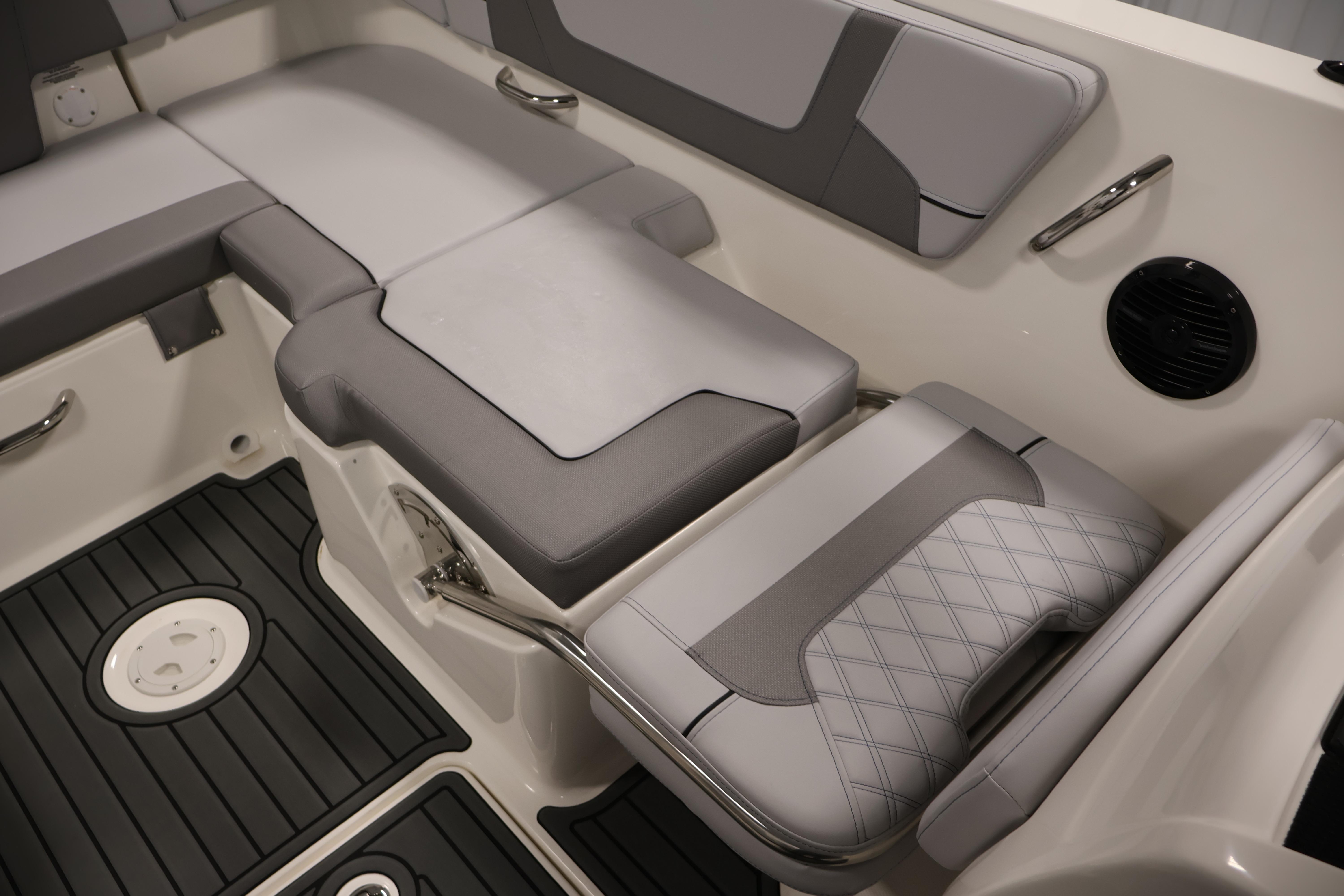 2026 Bayliner VR6 Bowrider I/O interior seating with gray upholstery and sleek design.