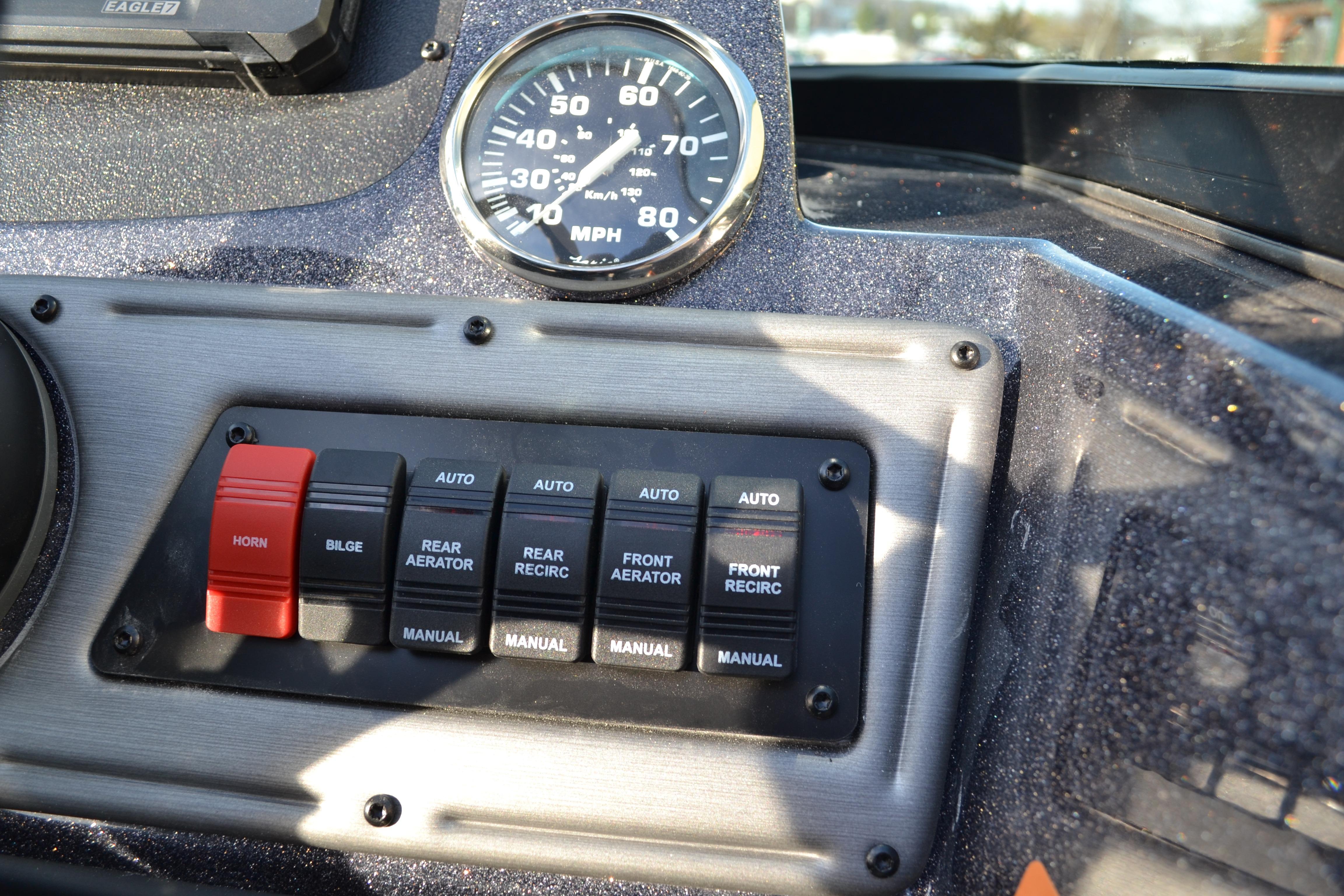 Control panel of 2026 Ranger VS1882SC Reata boat with speedometer and switches.
