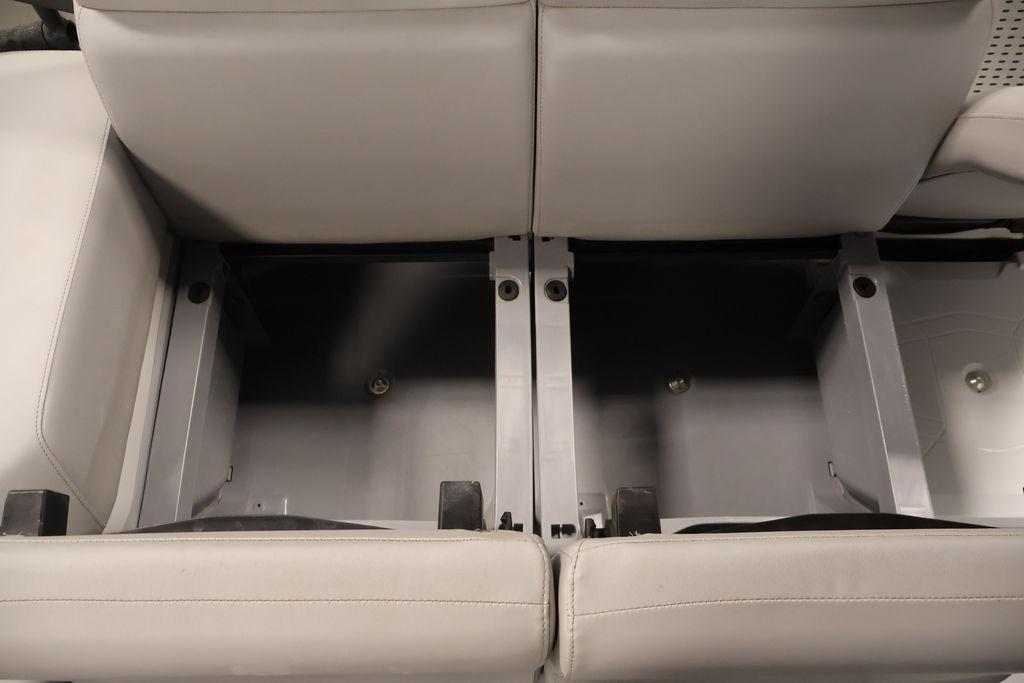 2023 Sea-Doo Switch Sport Compact storage compartment with open seating area.