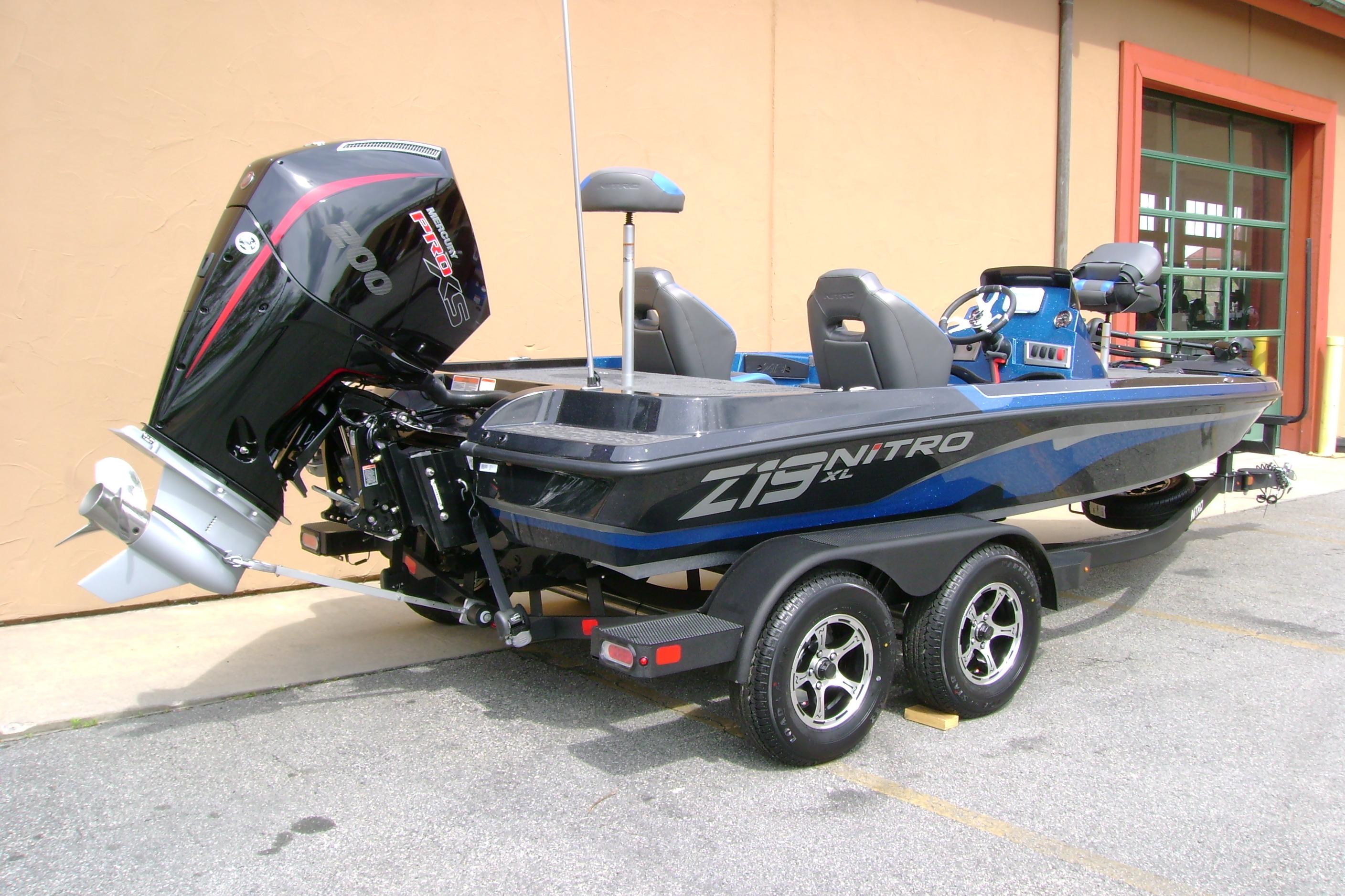 2026 Nitro Z19 XL boat with powerful outboard motor, parked on a trailer.