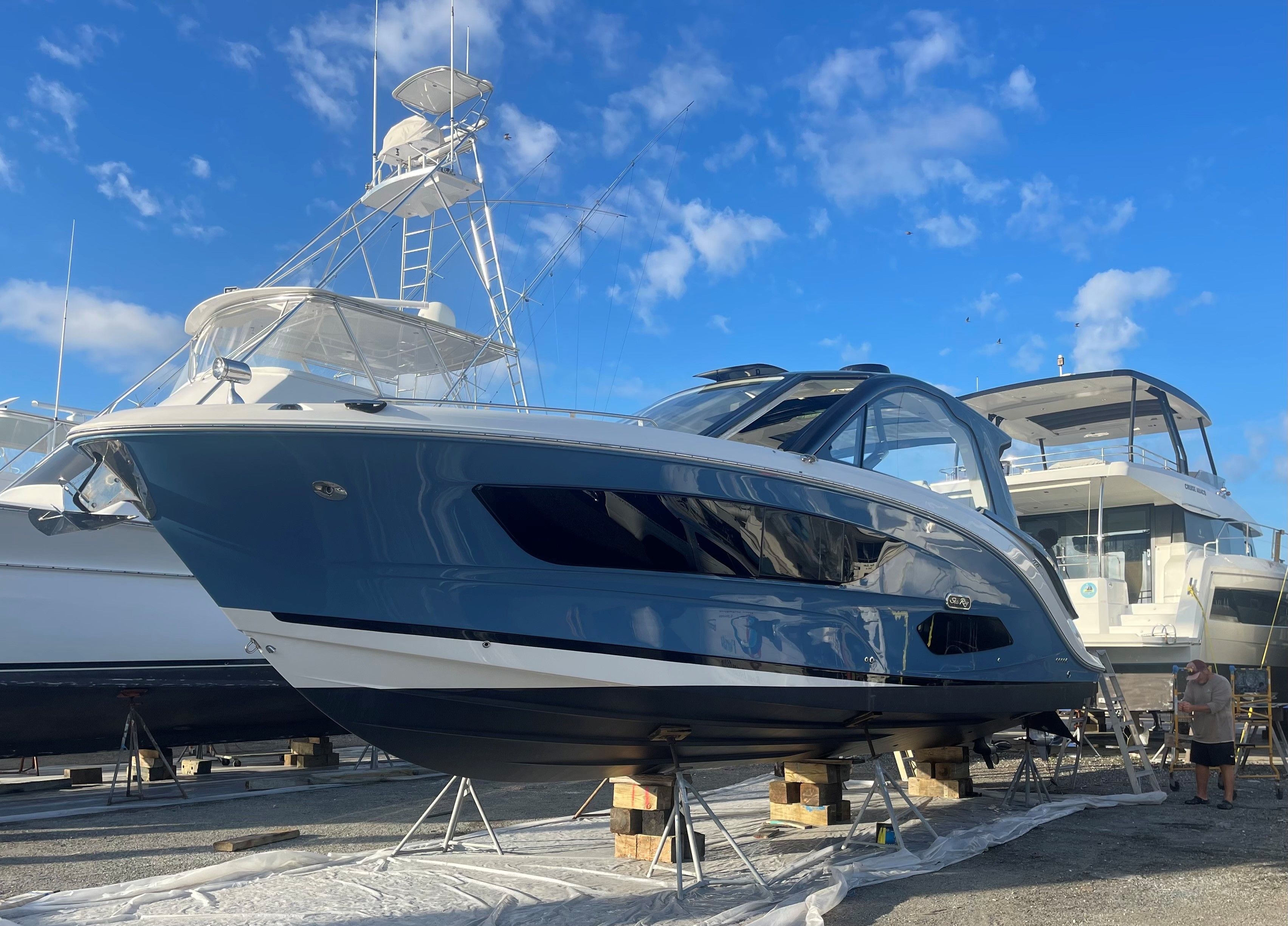 2023 Sea Ray Sundancer 370 Outboard on a dry dock.