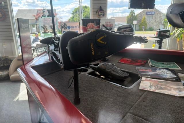 2026 Tracker Pro Team 175 boat interior with fishing gear and magazines.