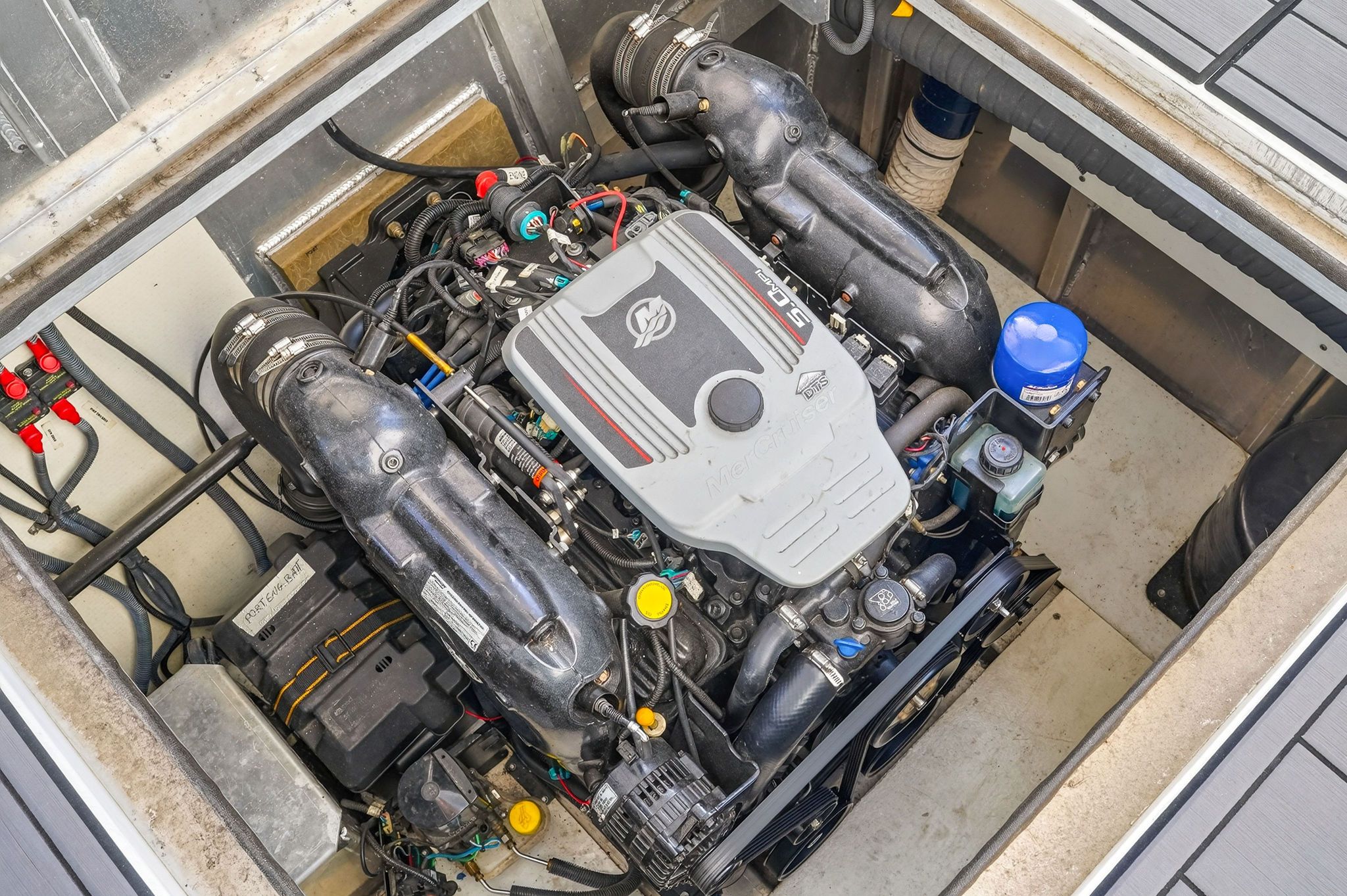 Engine compartment of a 2010 Houseboat Thoroughbred with engine.