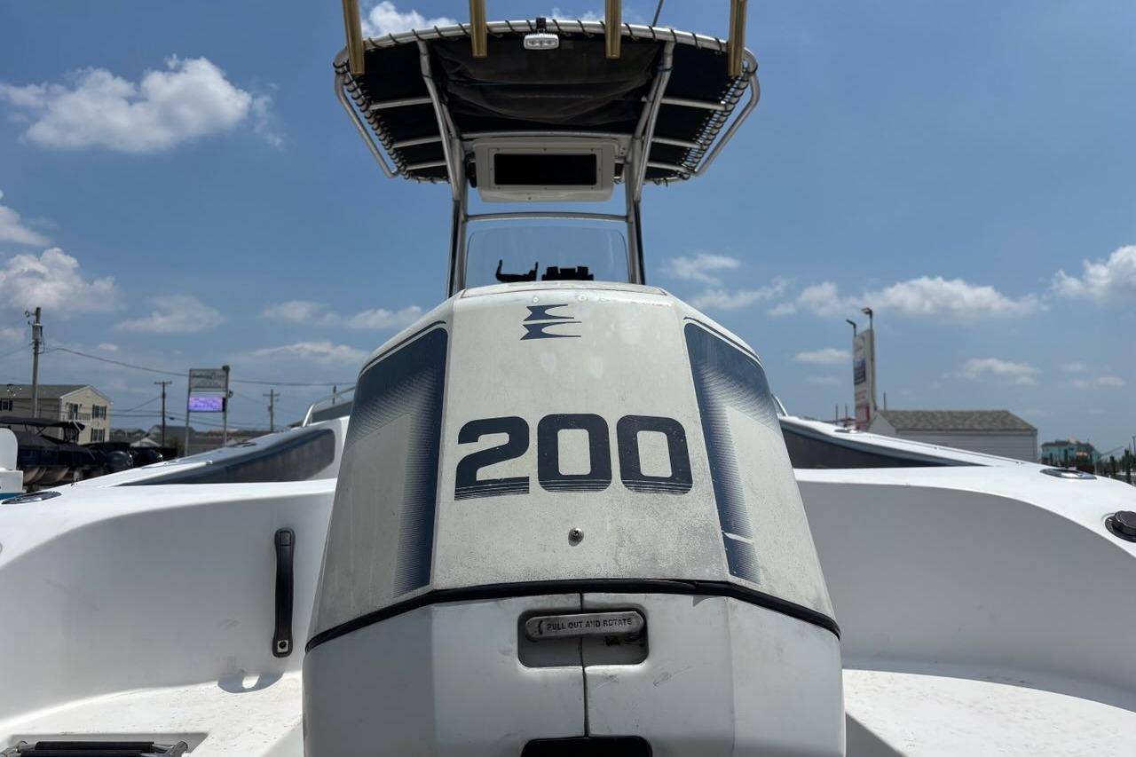 2002 Seaswirl Striper 2101 Center Console boat with 200 horsepower engine.