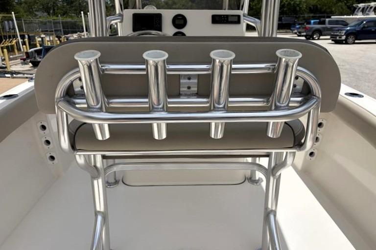 2023 Key West 203 FS boat with stainless steel rod holders and console.