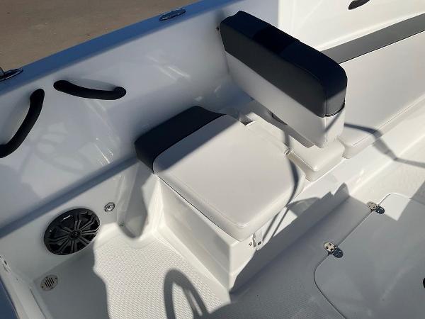 2025 Tahoe T18 boat interior with cushioned seating and speaker.