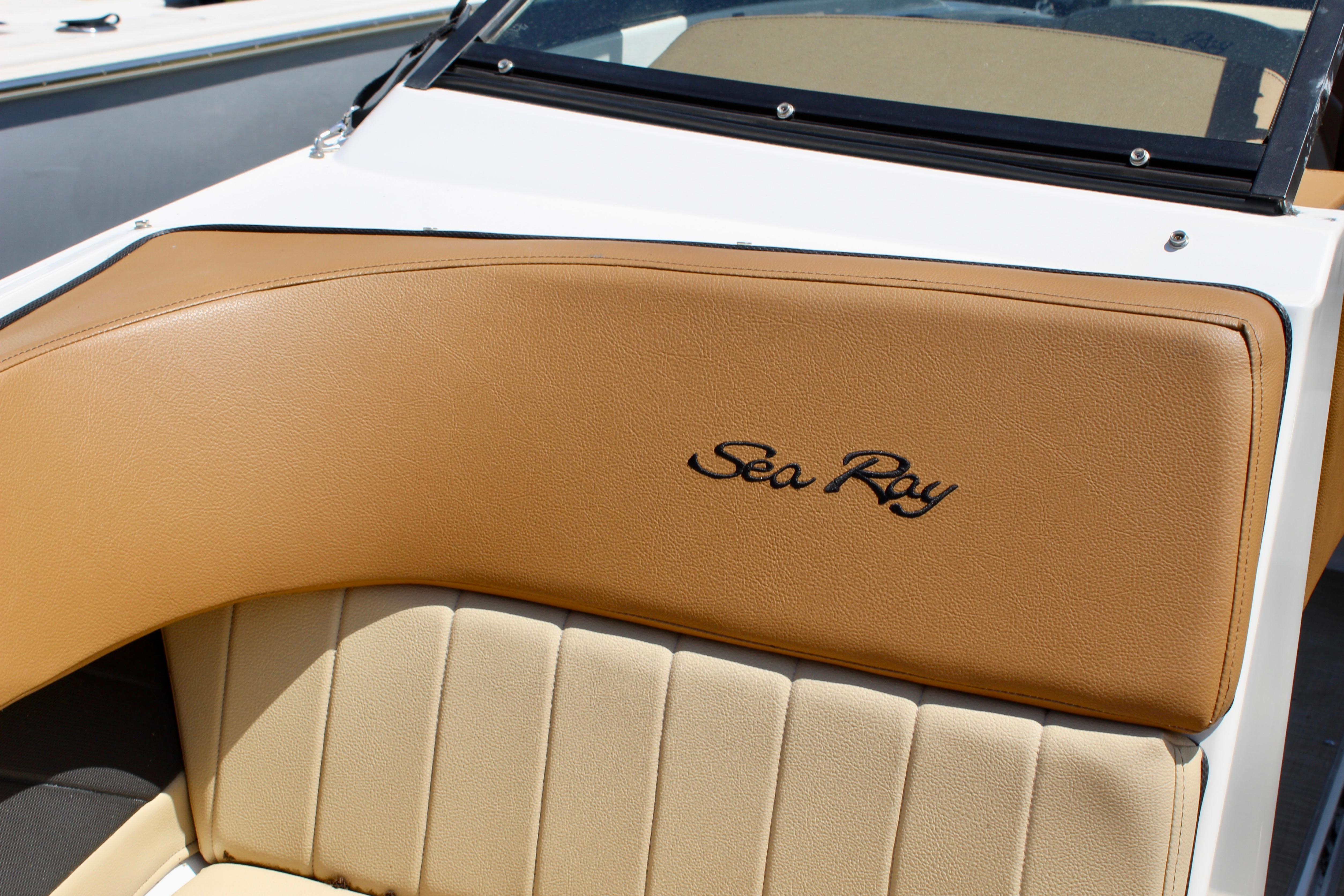 2018 Sea Ray SPX 190 Outboard boat interior with tan leather seating.