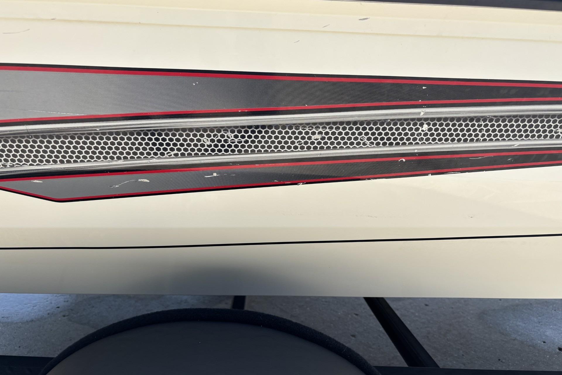 2017 Ranger RT178C boat with sleek, modern design and red-accented detailing.