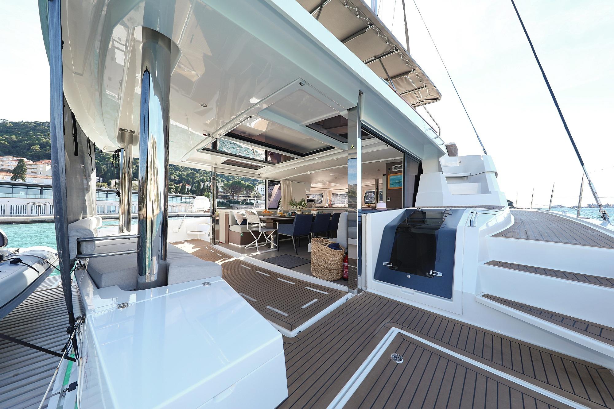 Luxurious 2021 Bali 5.4 yacht interior with open deck and modern seating area.