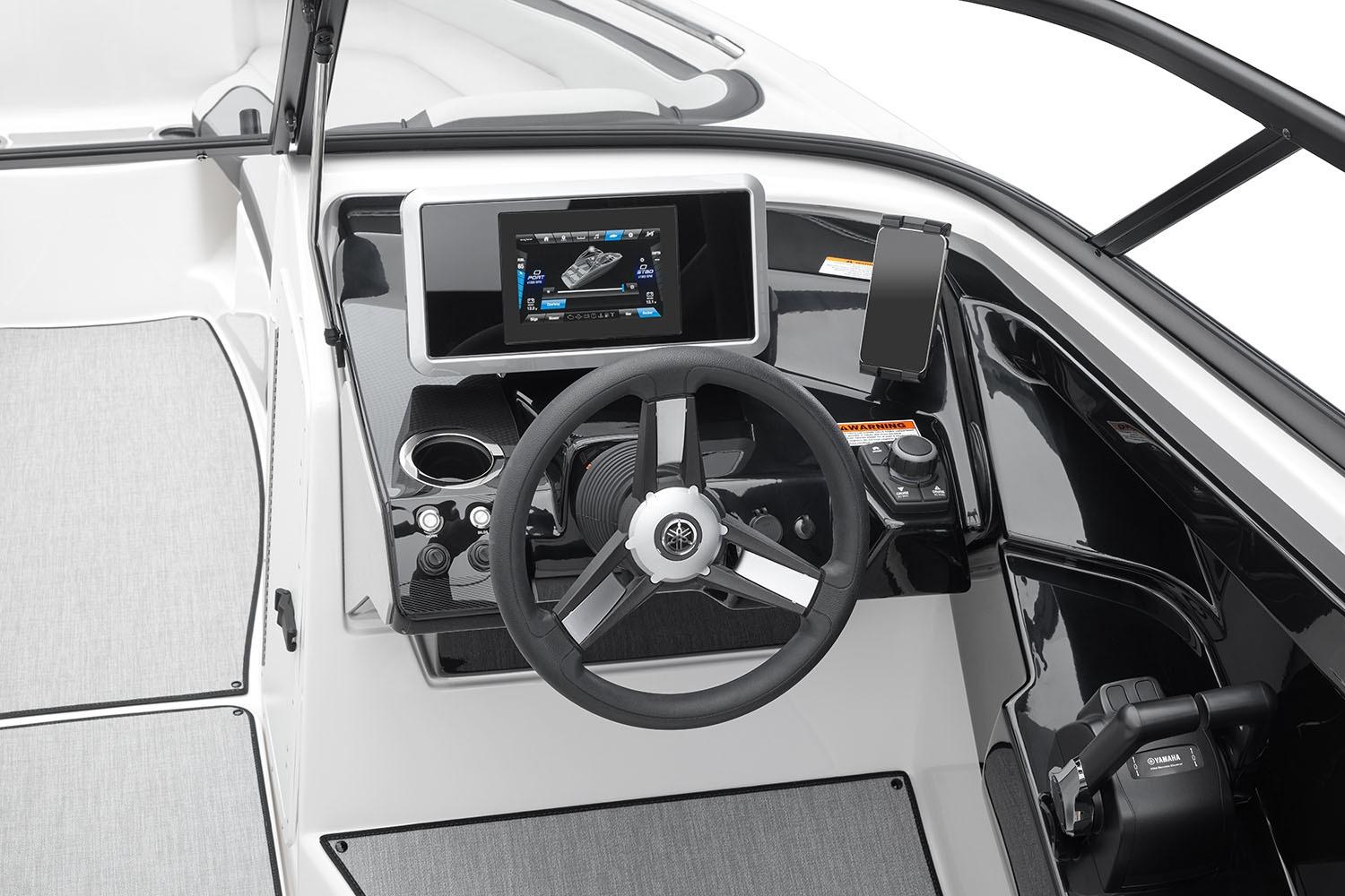 Manufacturer Provided Image: 2026 Yamaha Boats AR250 dashboard with steering wheel and touchscreen display.