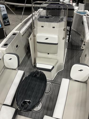 2025 Starcraft SVX 211 OB CC boat interior with seating and console.