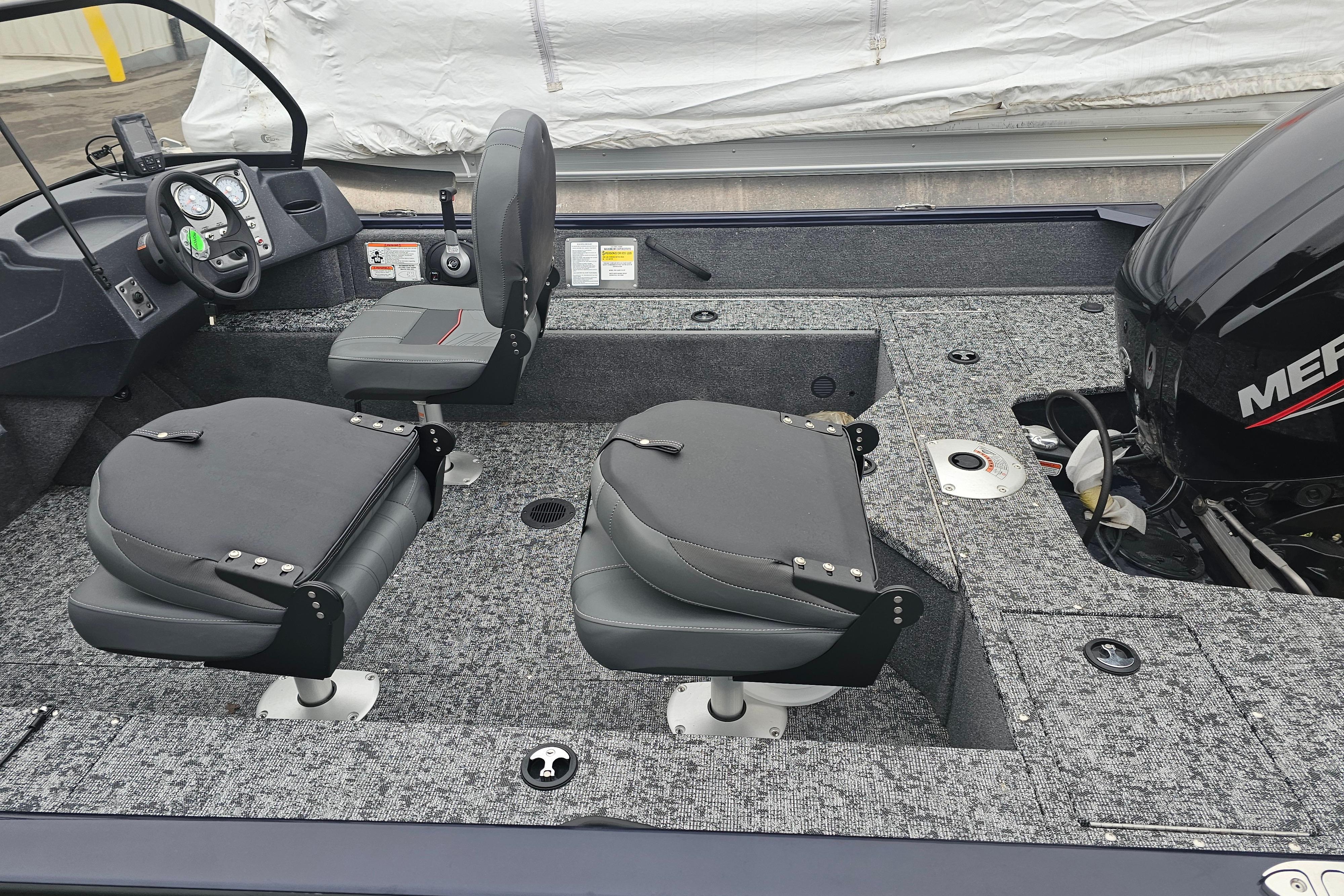 2025 Tracker Pro Guide V-16 WT boat interior with seating and controls.