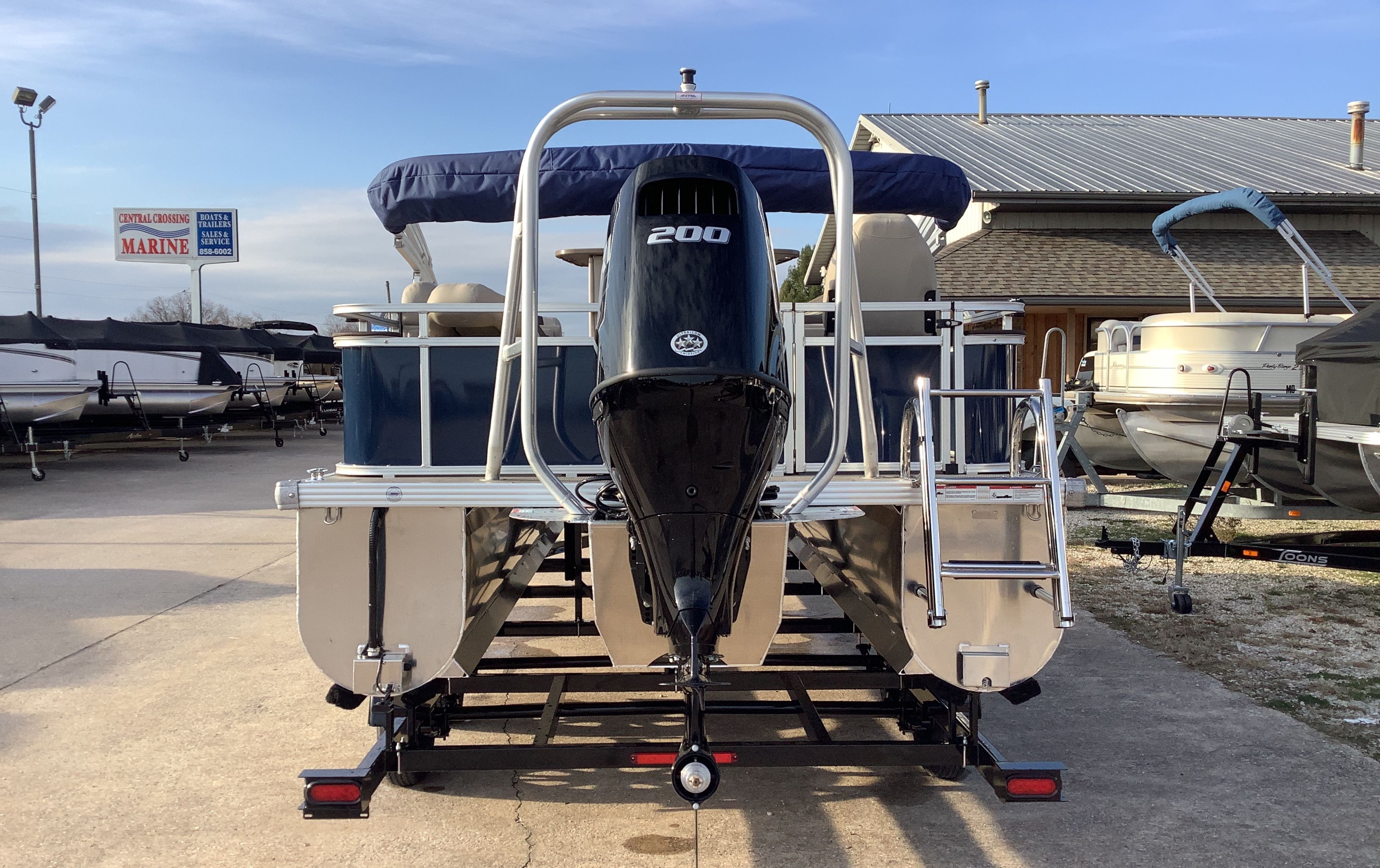 2026 Landau Alure 23CC Fish boat with outboard motor.