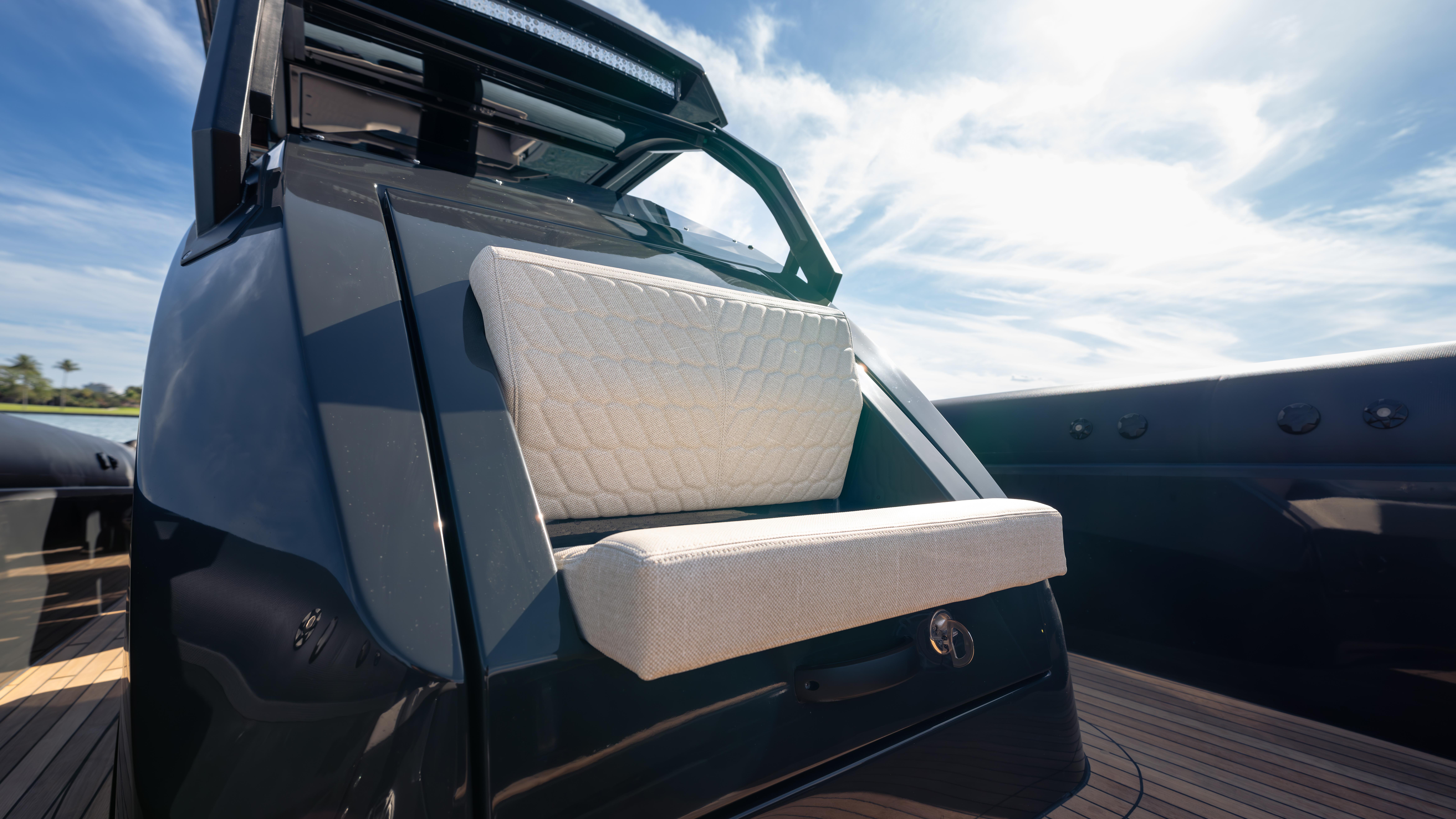 2025 Skipper-BSK 38NC boat with sleek design and cushioned seating under a clear blue sky.