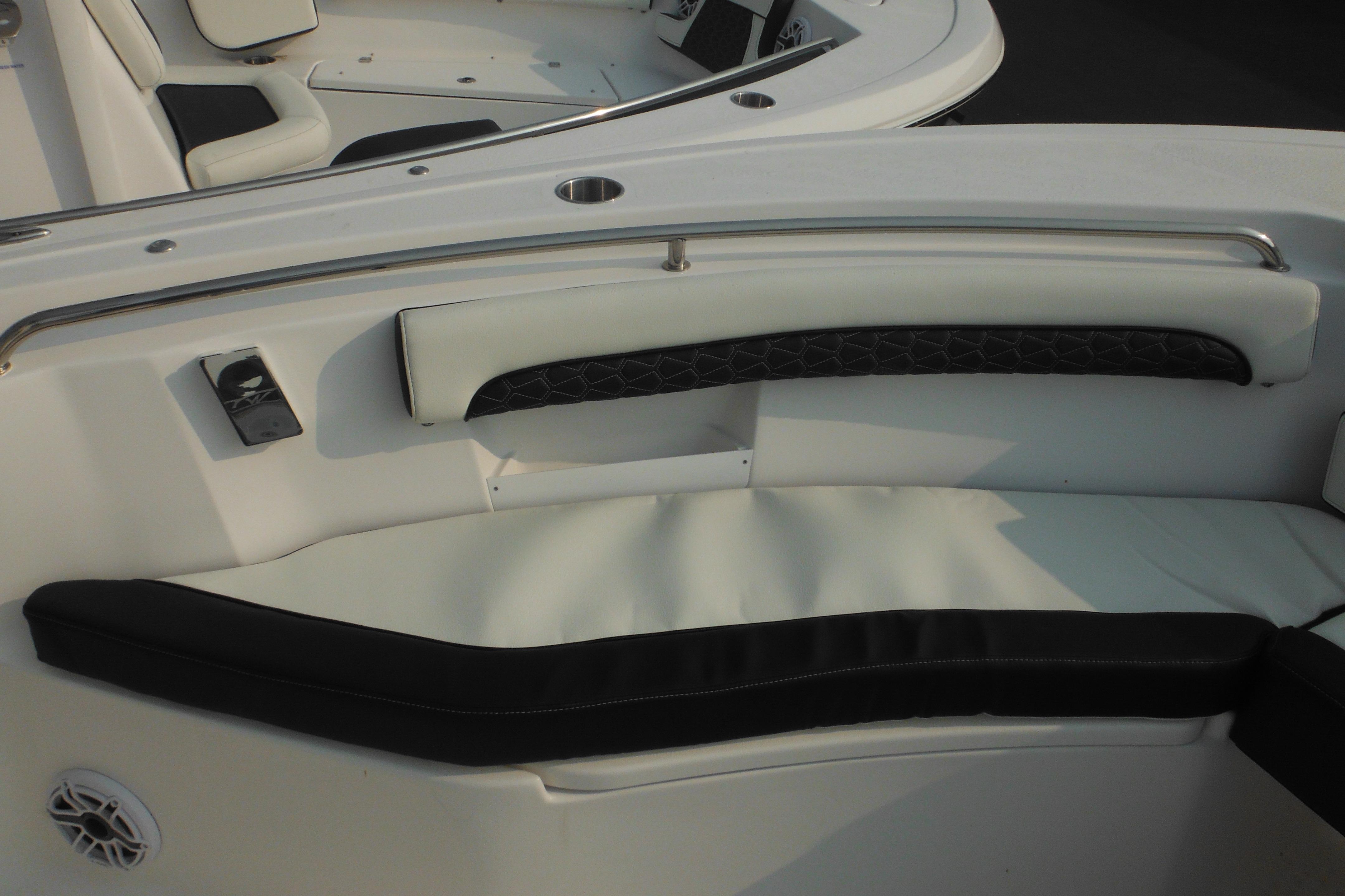 2026 Tidewater 232 LXF boat interior with cushioned seating and sleek design.