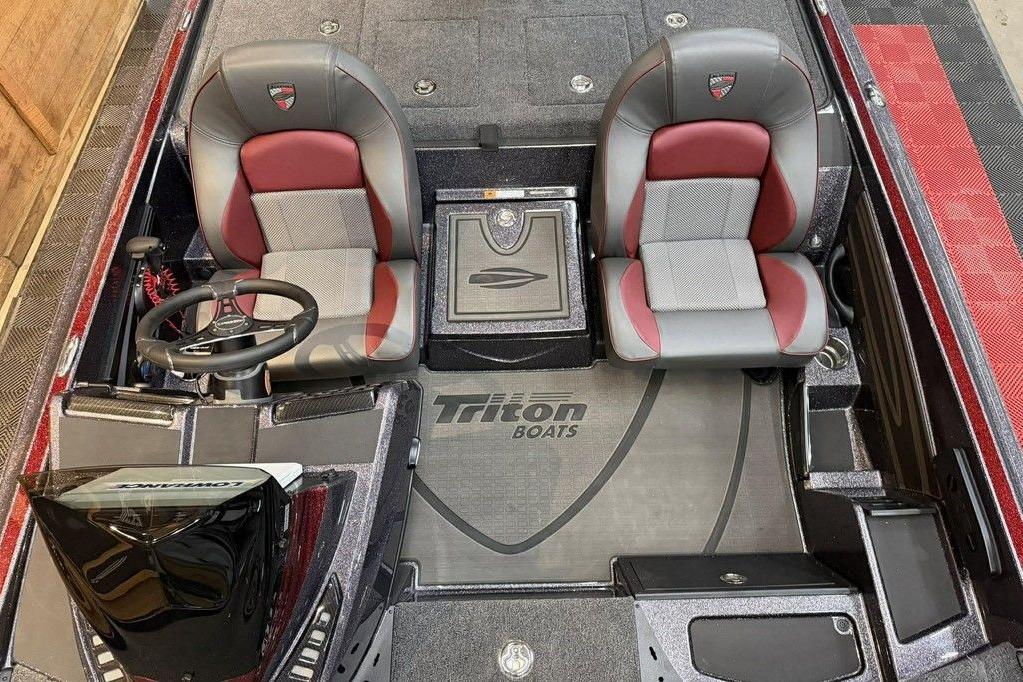 2026 Triton 20XP Patriot boat interior with dual seats and steering console.