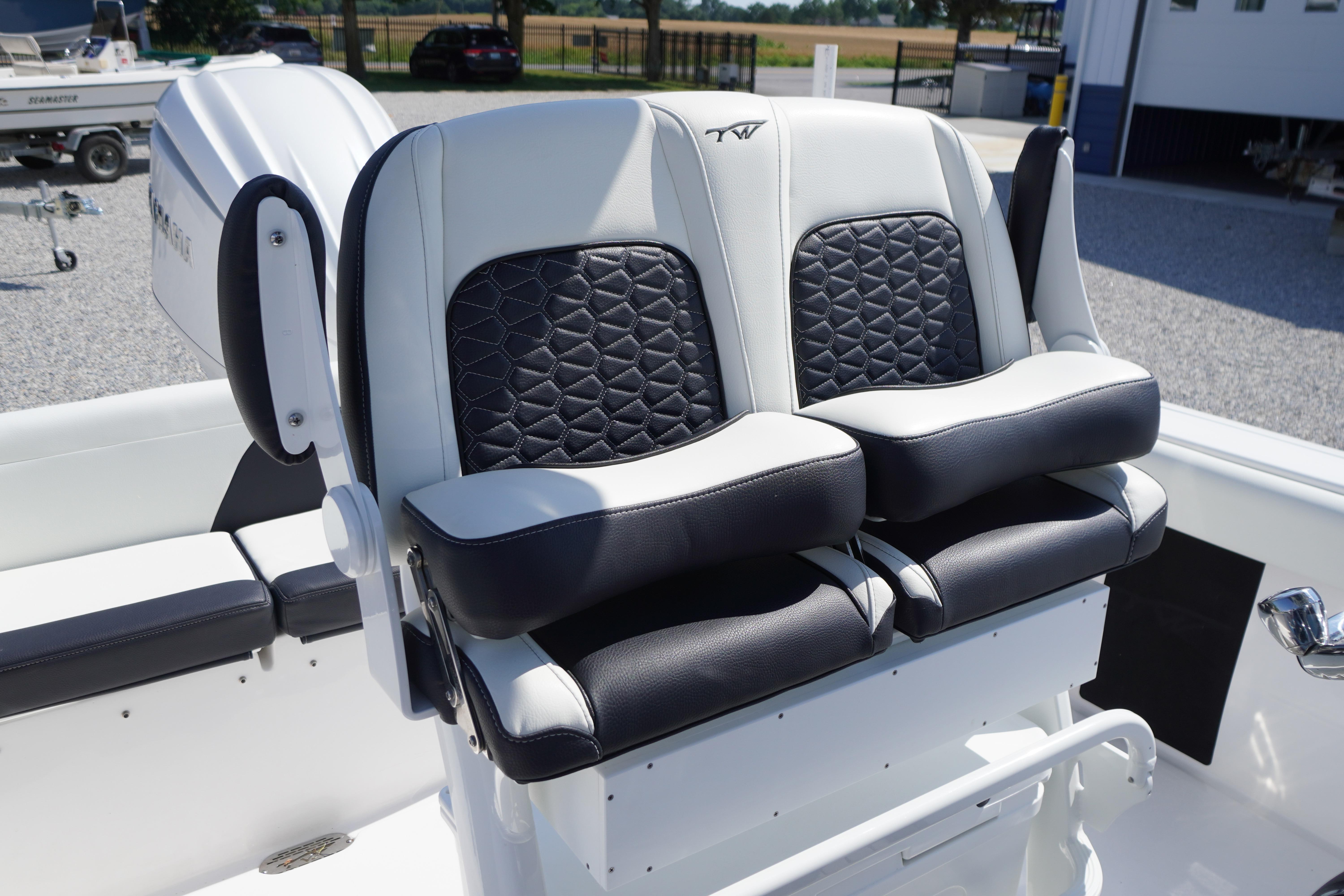 2025 Tidewater 232 SS boat seats with black and white upholstery, featuring a modern design.