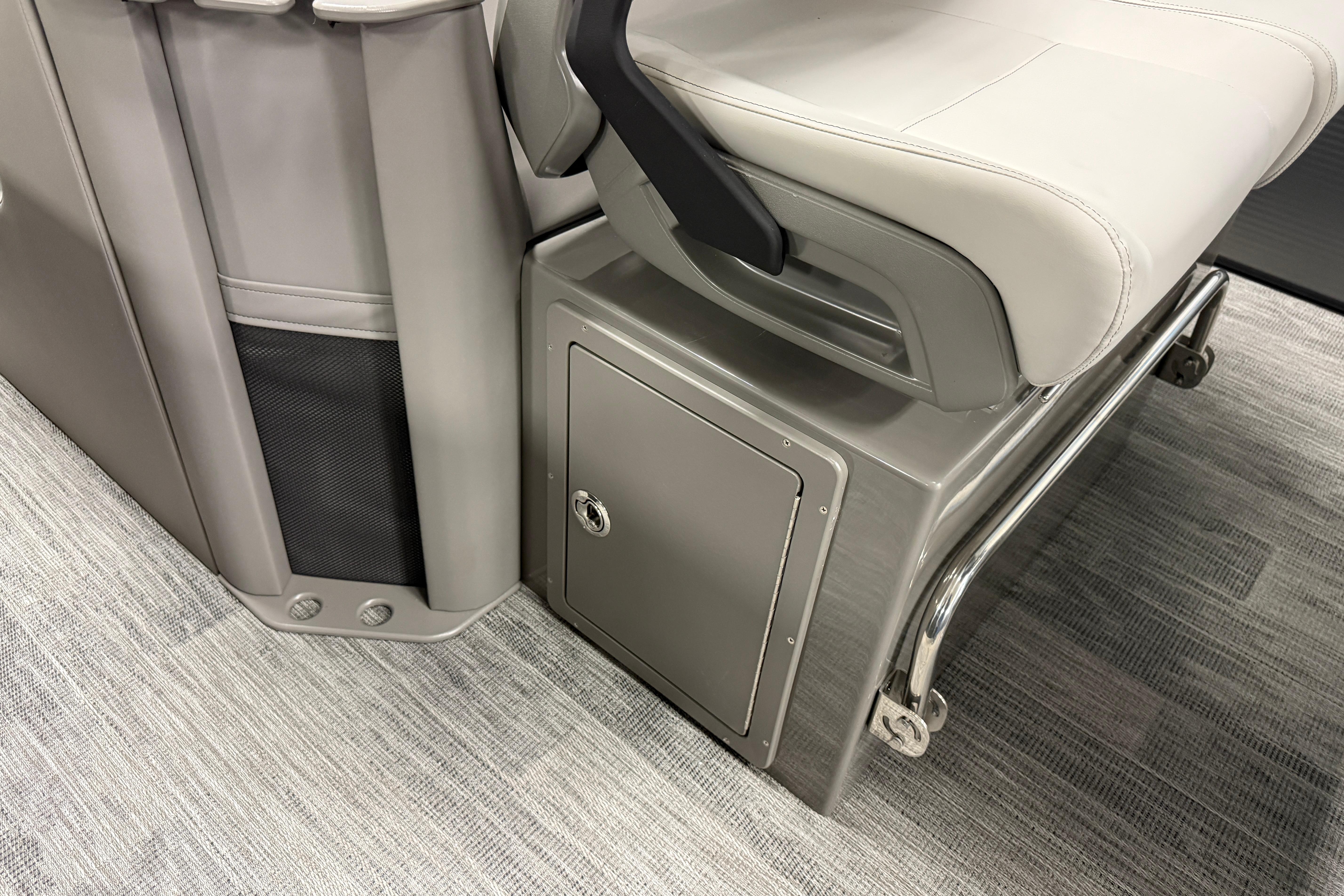 2026 Qwest M-Class 22 Pro Sport boat seat and storage compartment detail.