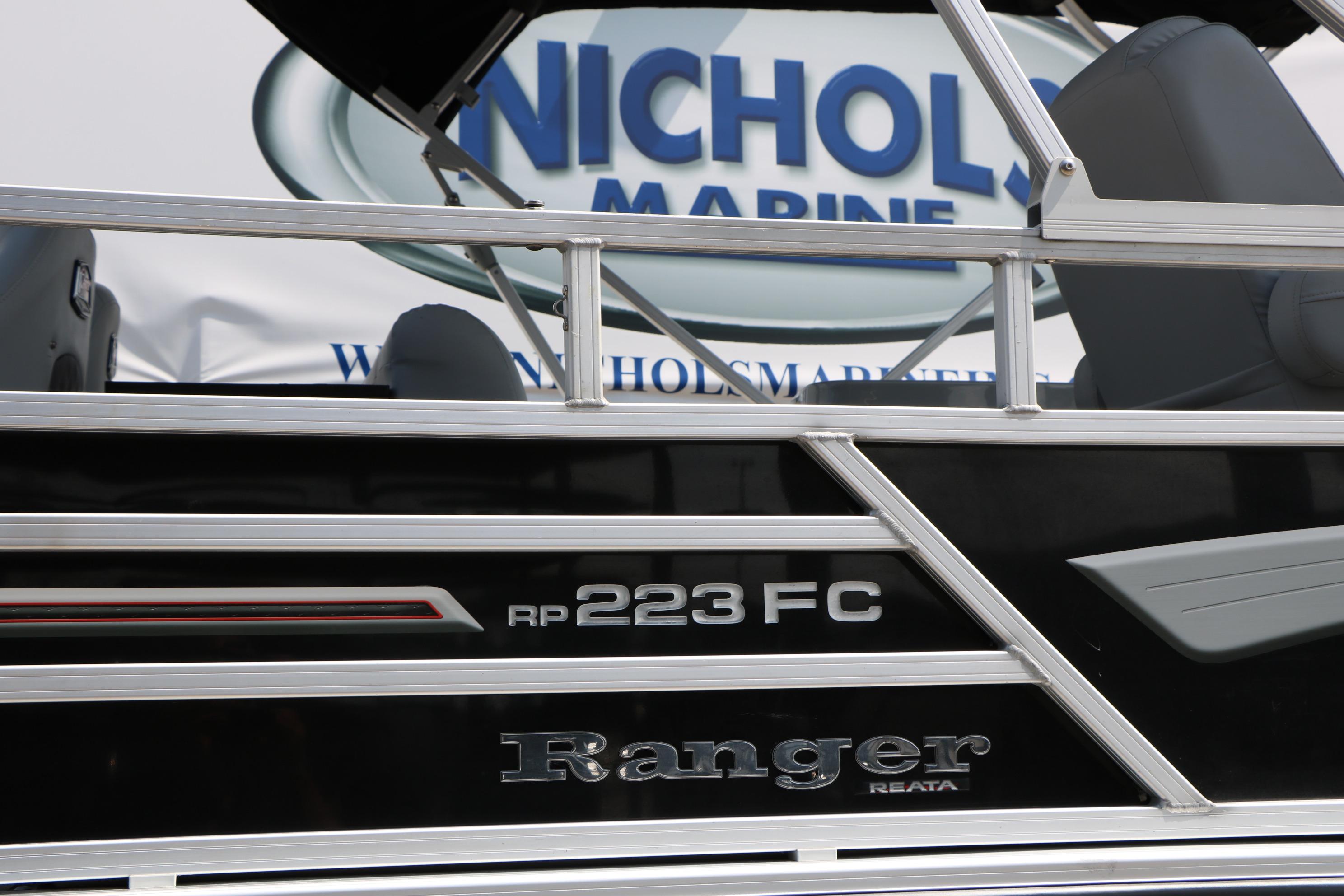 2021 Ranger 223FC boat at Nichols Marine dealership display.