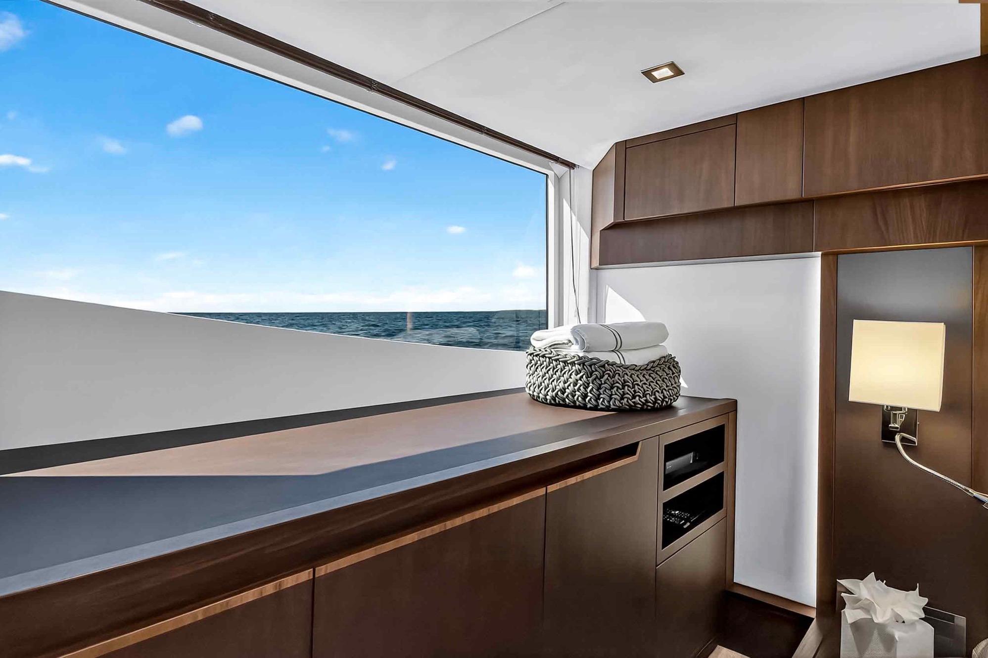 Interior of 2021 Galeon 500 Fly yacht with ocean view and modern furnishings.