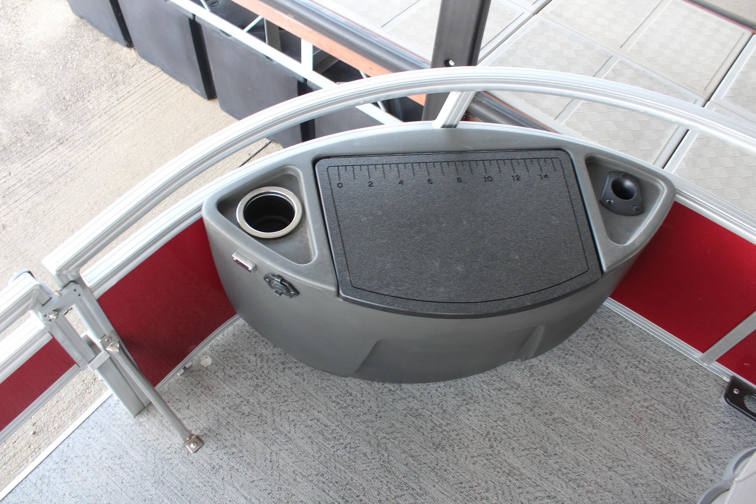 2026 Sun Tracker Bass Buggy 18 DLX fishing station with cup holder and measuring board.