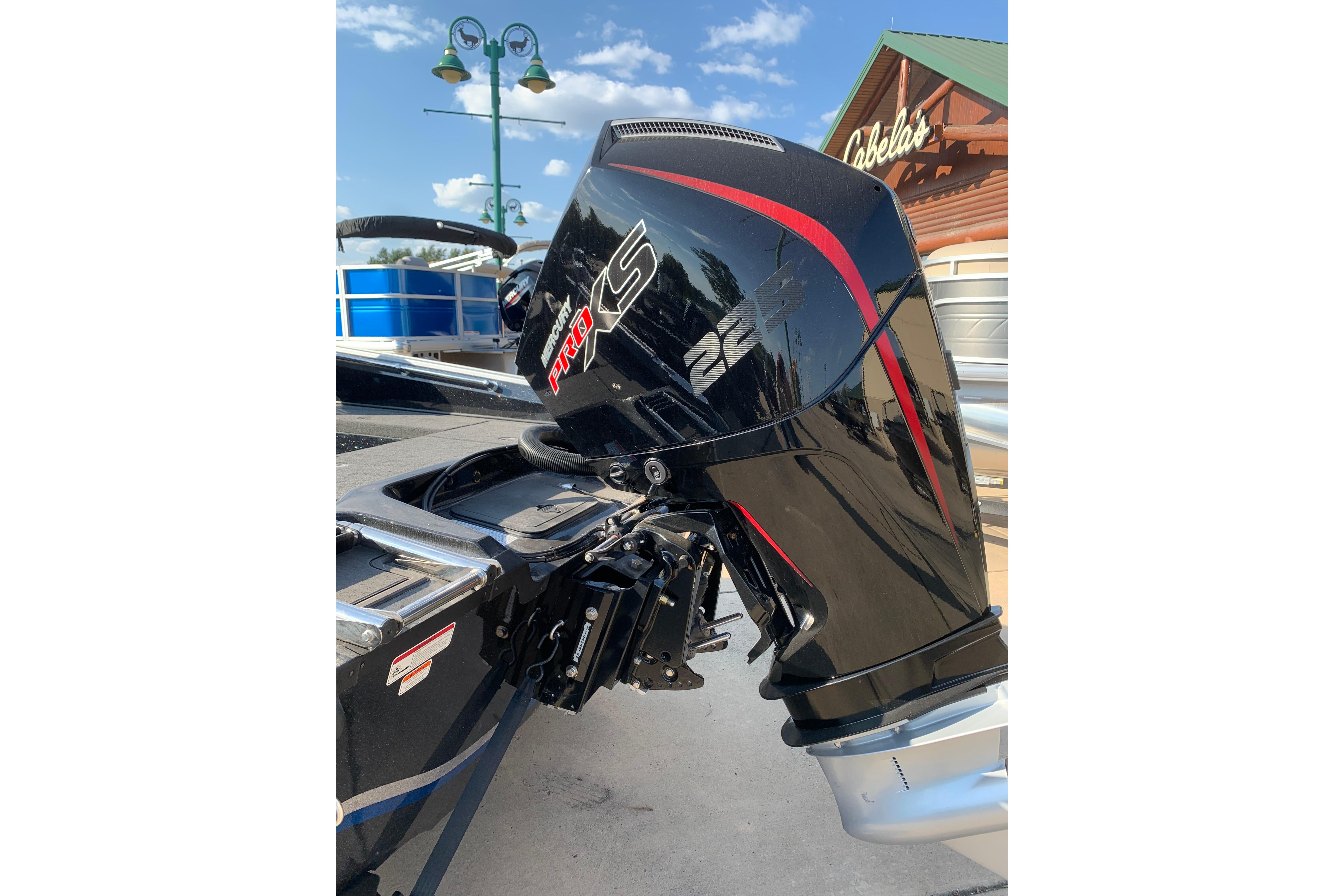 2025 Nitro ZV20 boat with Mercury Pro XS 225 outboard motor, displayed outdoors.