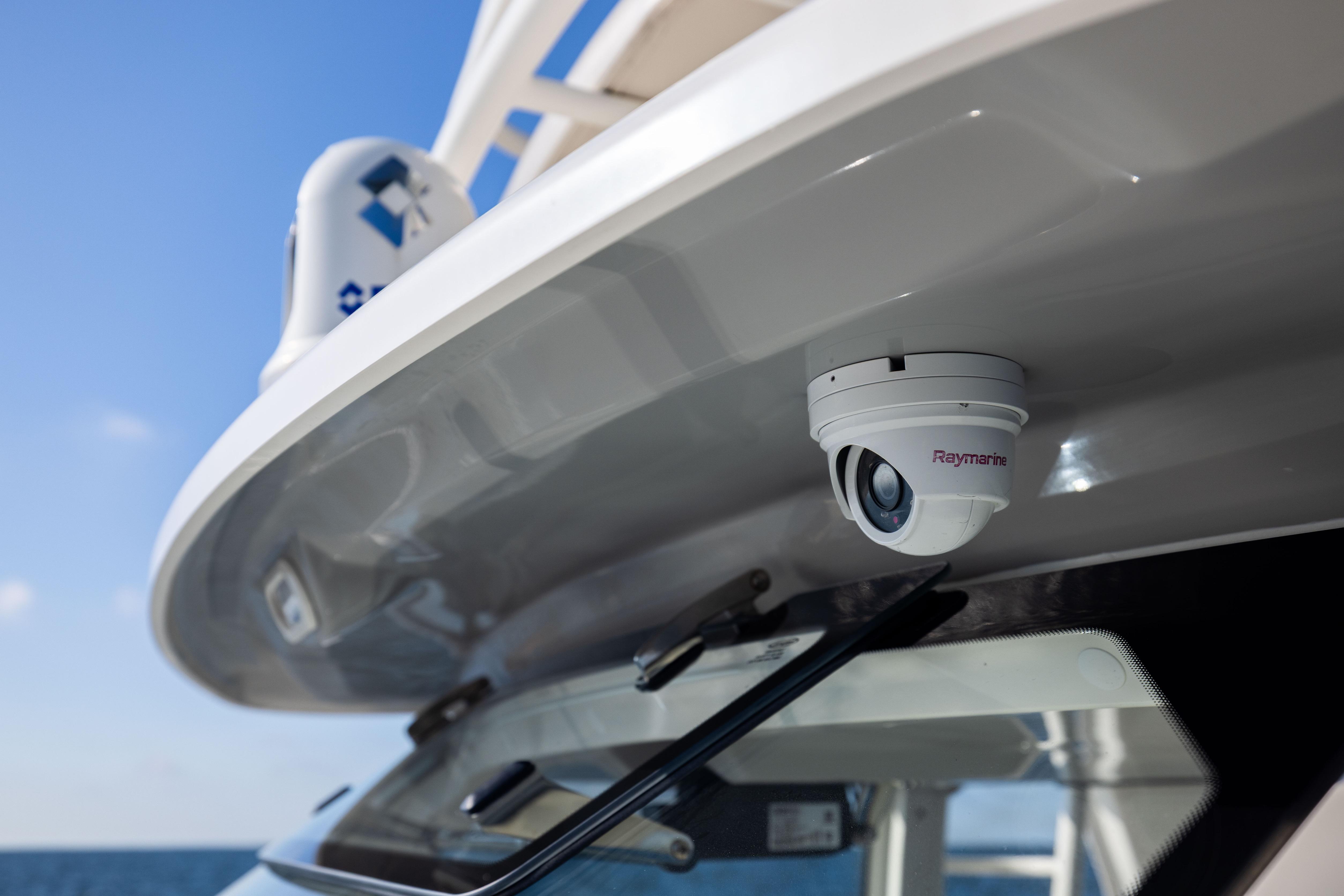 2021 Boston Whaler 420 Outrage with Raymarine camera, ocean backdrop.