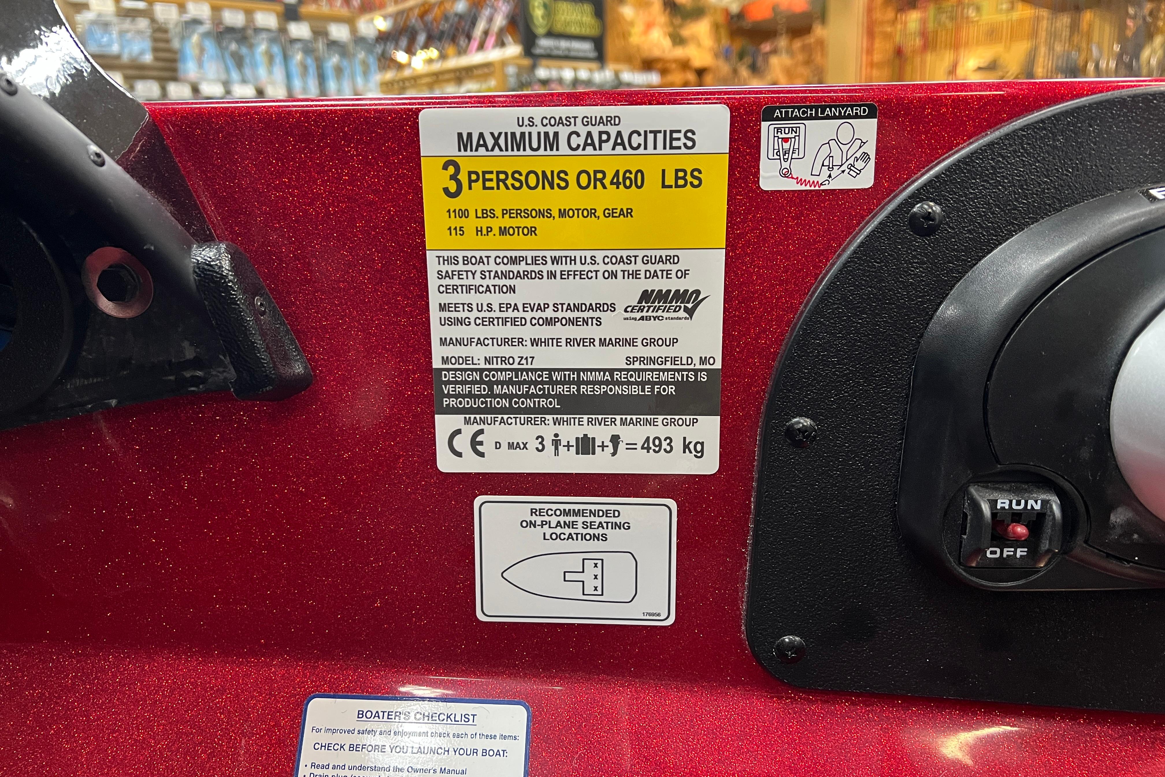 2026 Nitro Z17 boat capacity label, showing maximum 3 persons or 460 lbs, 115 HP motor.