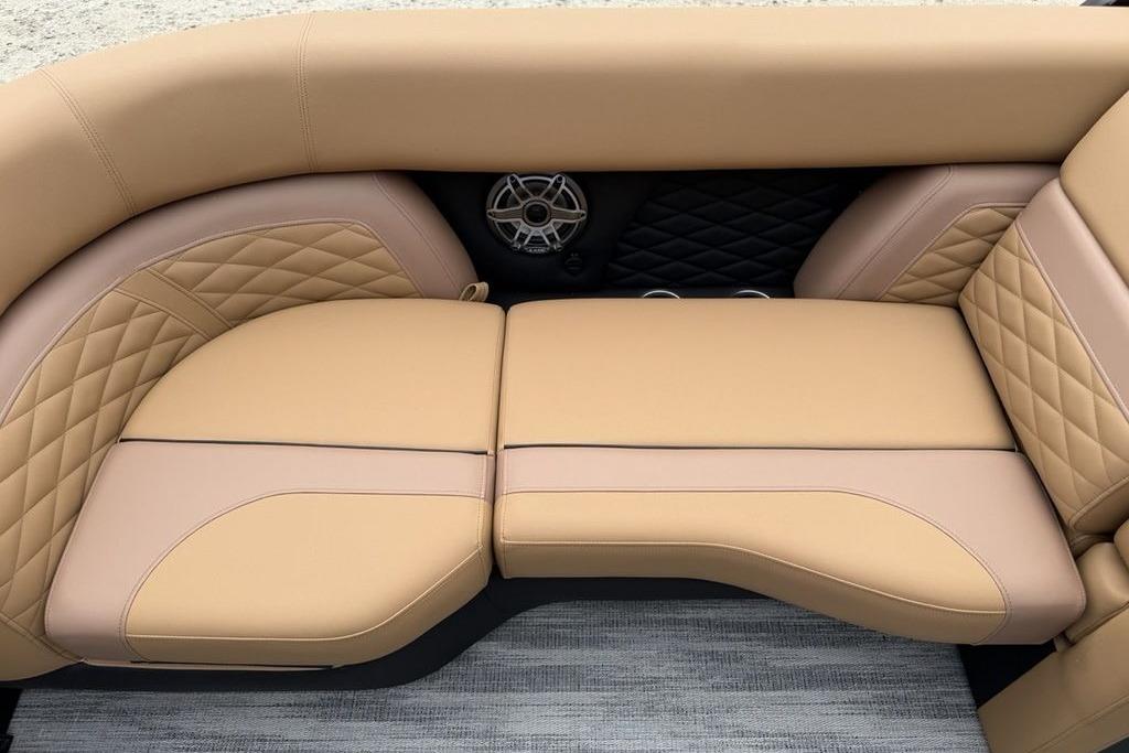 Luxurious tan seating on 2026 Godfrey Monaco 235 SFLC iMPACT boat.