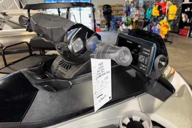 2020 Sea-Doo FISH PRO dashboard with controls and display in a showroom setting.