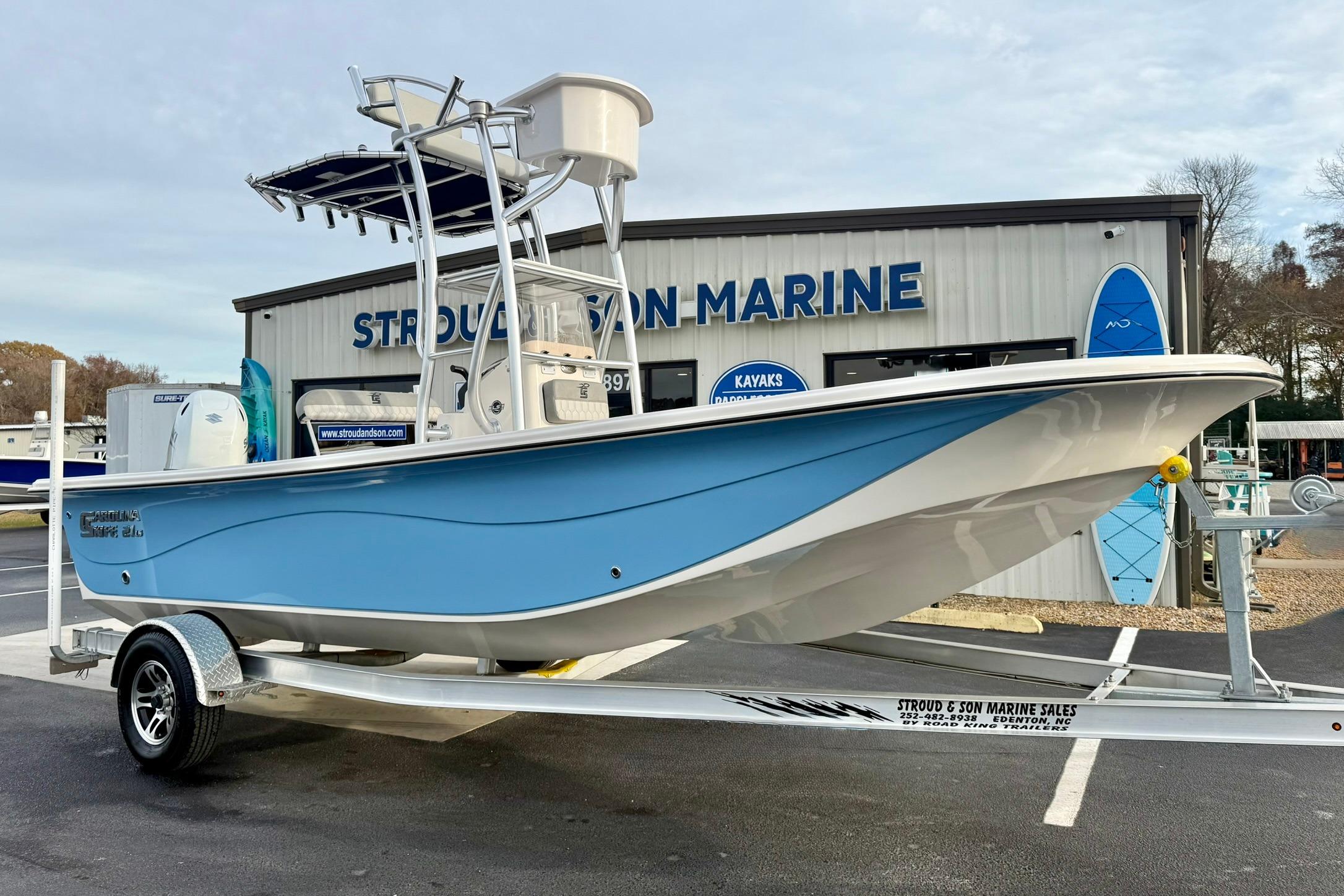 2025 Carolina Skiff 21 LS boat on trailer at Stroud and Son Marine dealership.